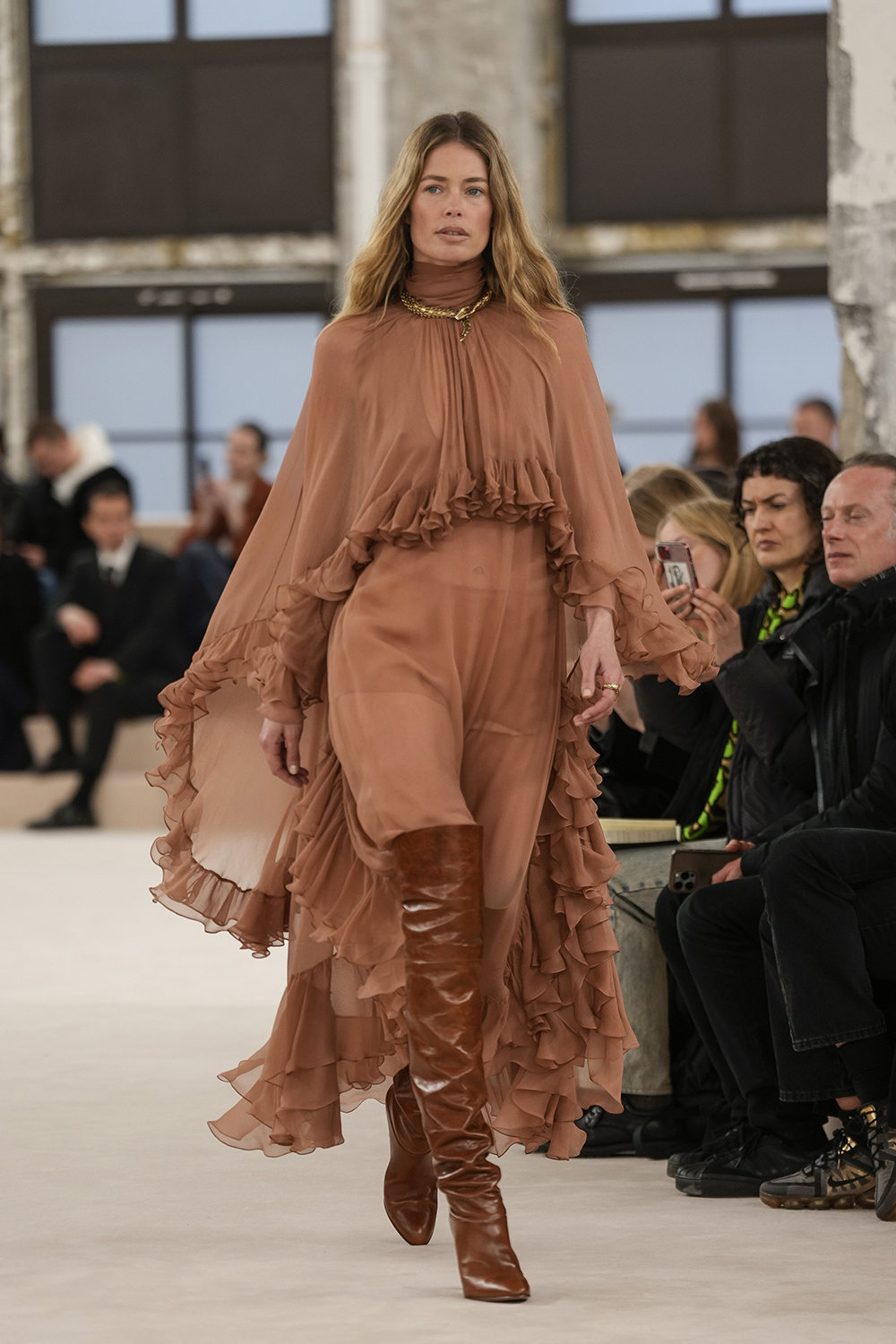 Doutzen Kroes wears a biscuit-hued ensemble as part of the collection. Photo / AP