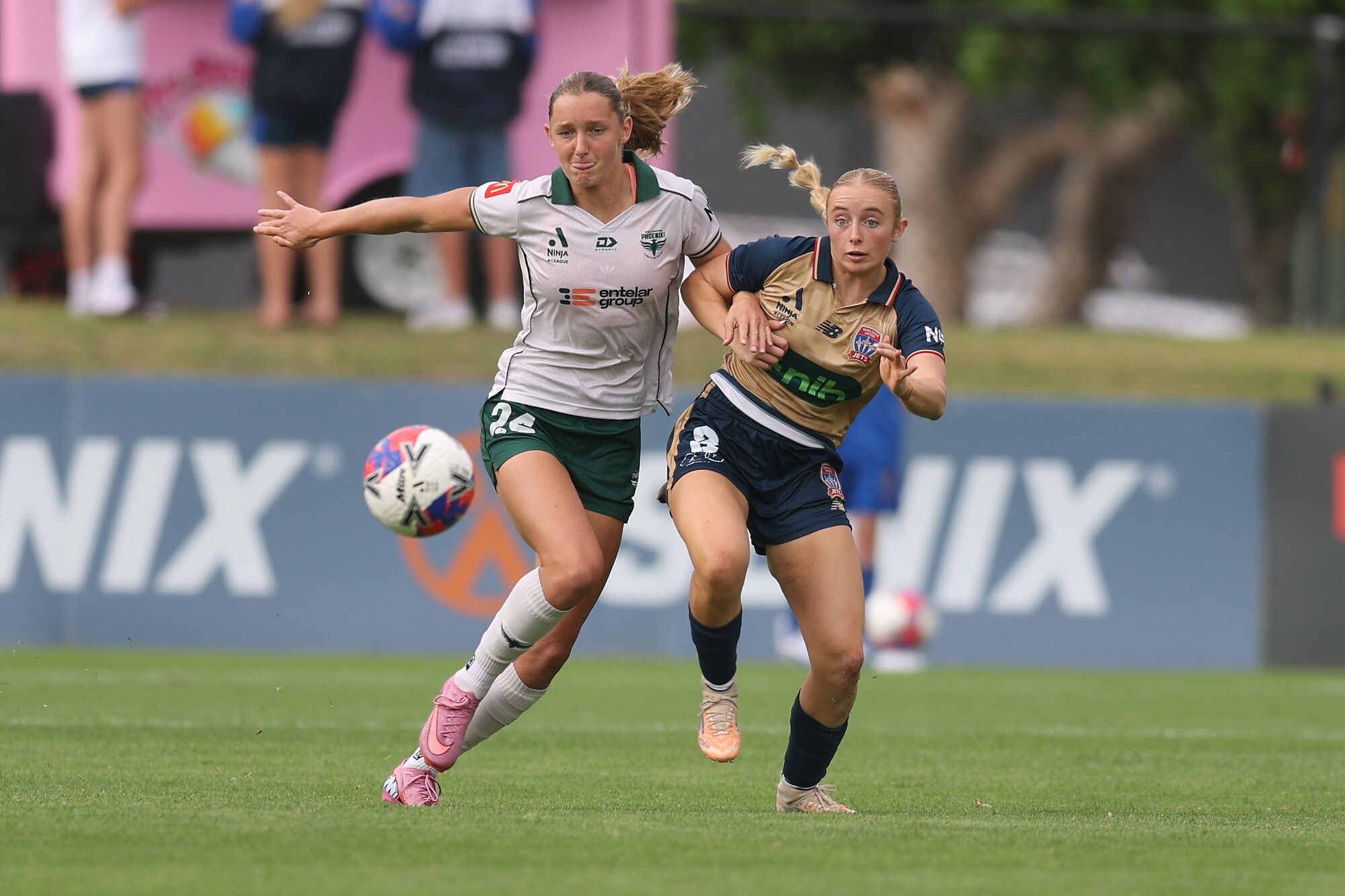 Hat-trick heroine Pia Vlok competes for the ball with Emma Dundas, of the Jets, in Sunday's match. Photo / Getty Images