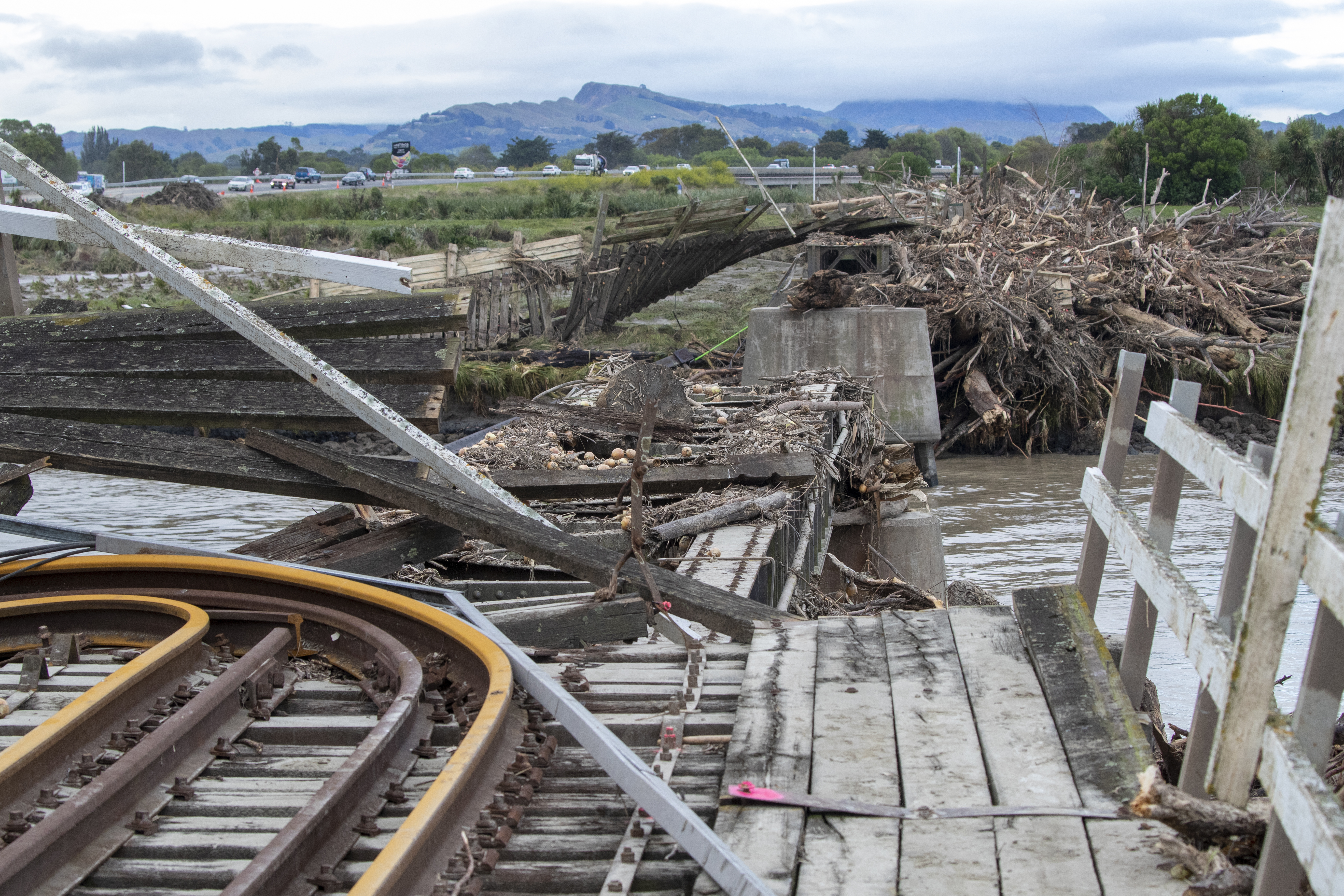 Damage to the Waitangi Rail Bridge near Awatoto soon after Cyclone Gabrielle. Photo / Mark Mitchell