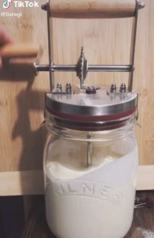 Making your own butter at home takes just 15 minutes and some elbow grease, according to one devotee. Photo / TikTok