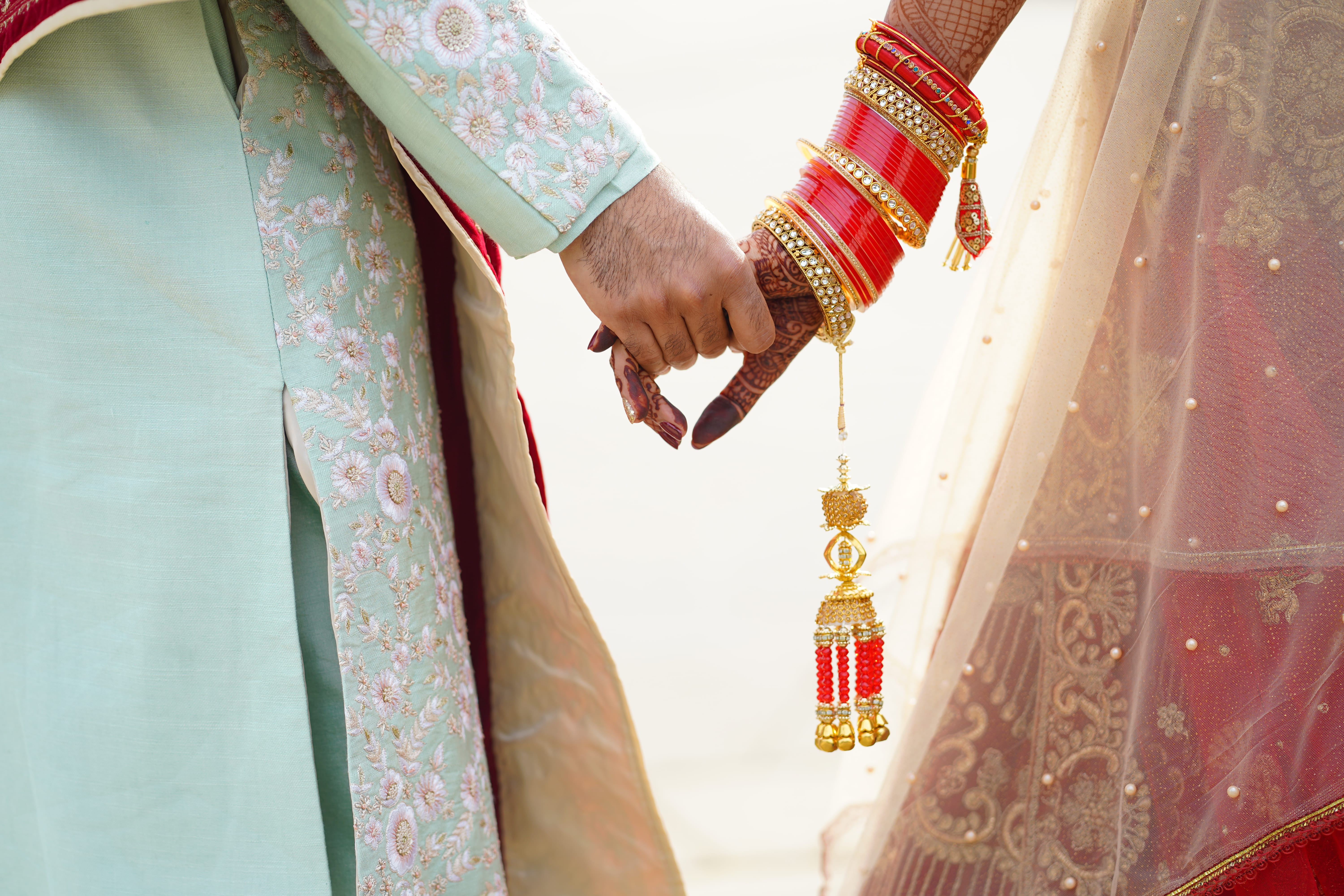 The couple was married in New Zealand in November 2024, and the bride's immigration woes followed.