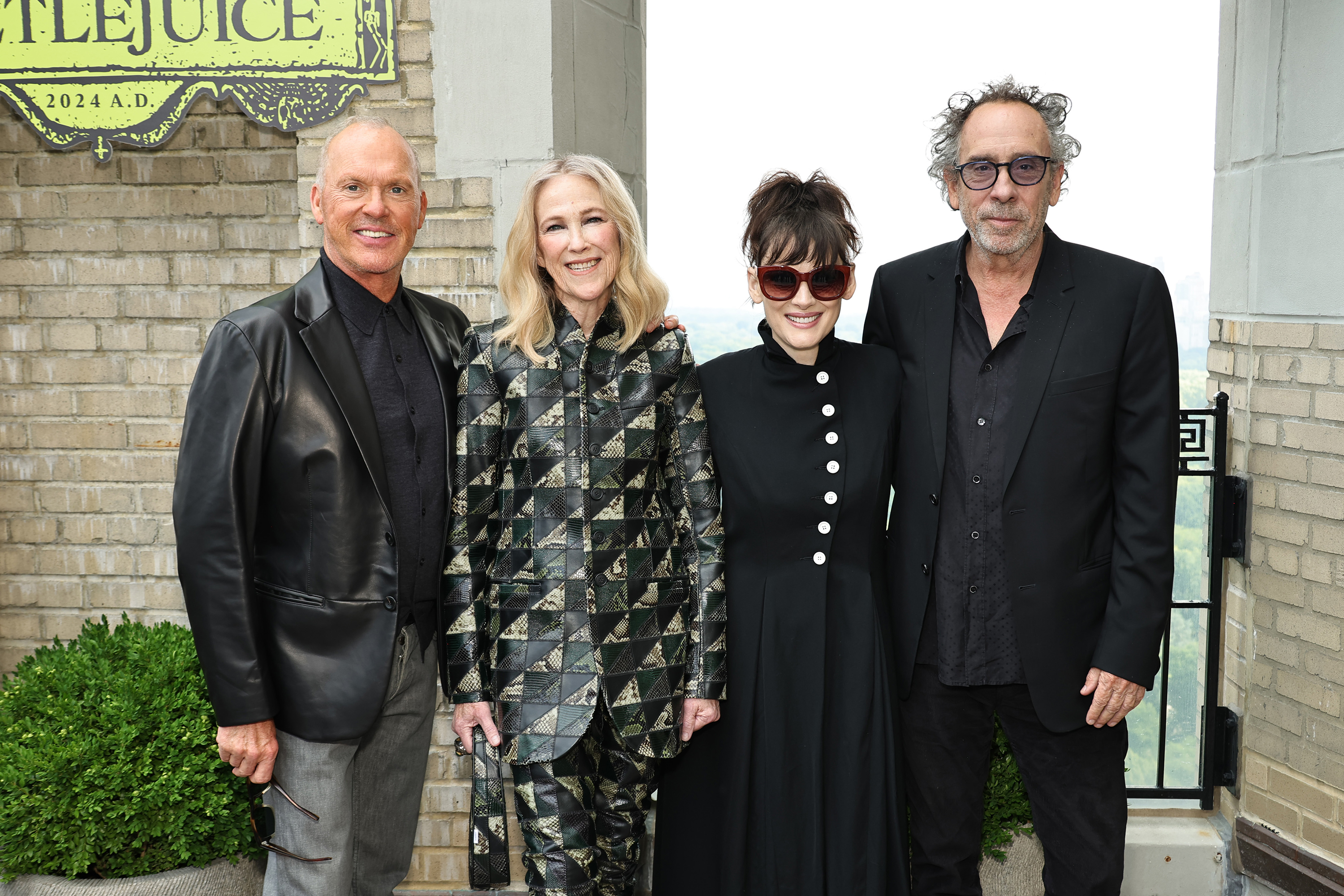 From left, Keaton, Catherine O’Hara, Ryder and the director Tim Burton, all participants from the original film, in New York to promote the sequel. Photo / Getty Images