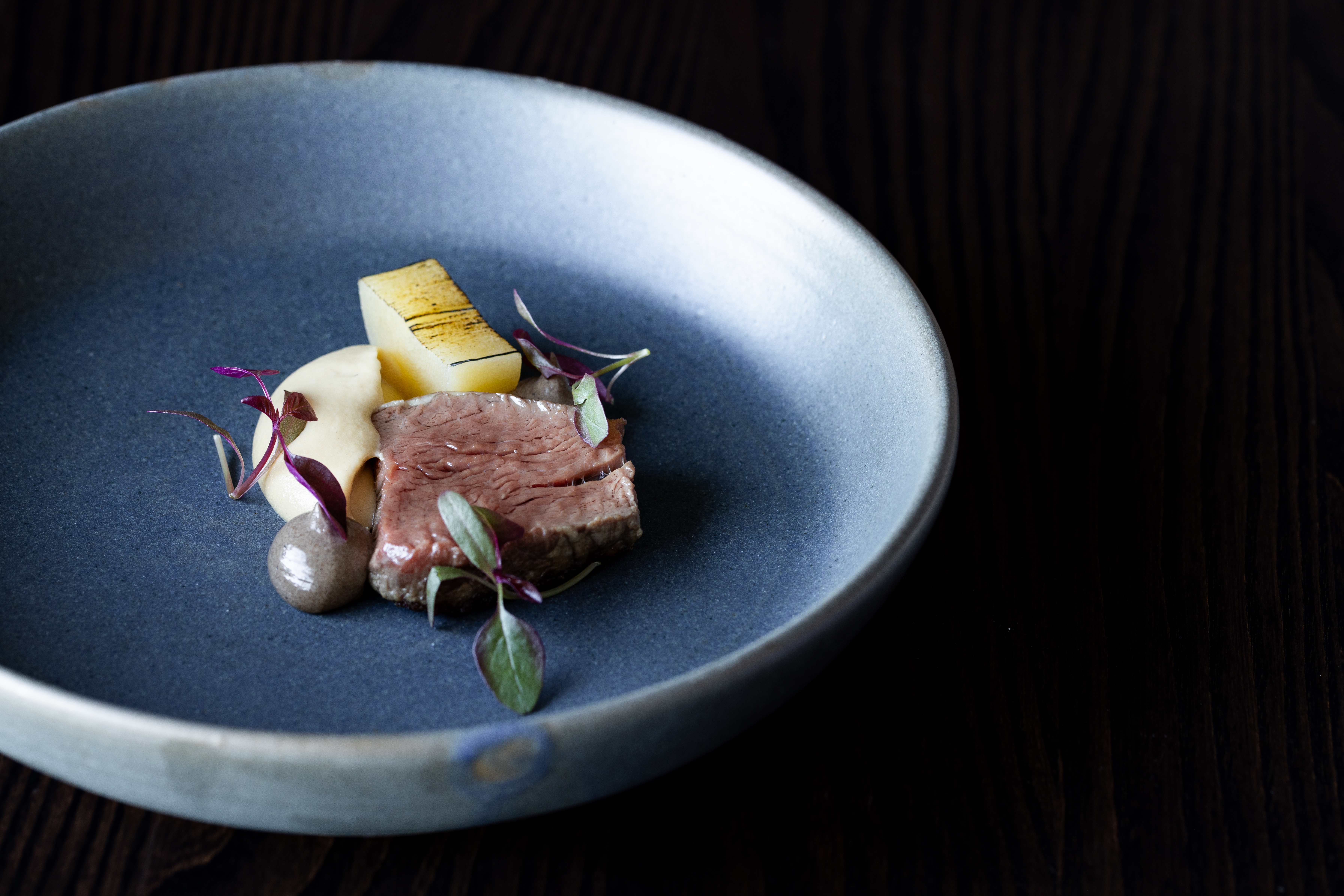 Queensland Wagyu with black garlic puree. Photo / Babiche Martens