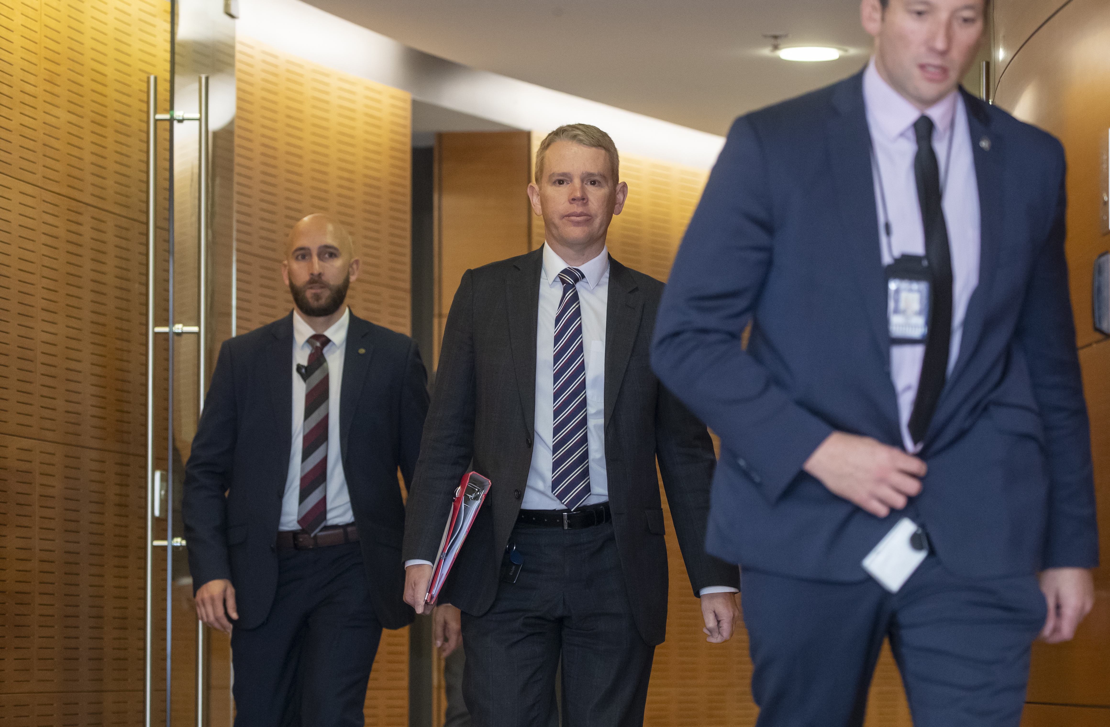 Prime Minister Chris Hipkins arriving at the Beehive theatrette to announce the resignation of Michael Wood. Photo / Mark Mitchell