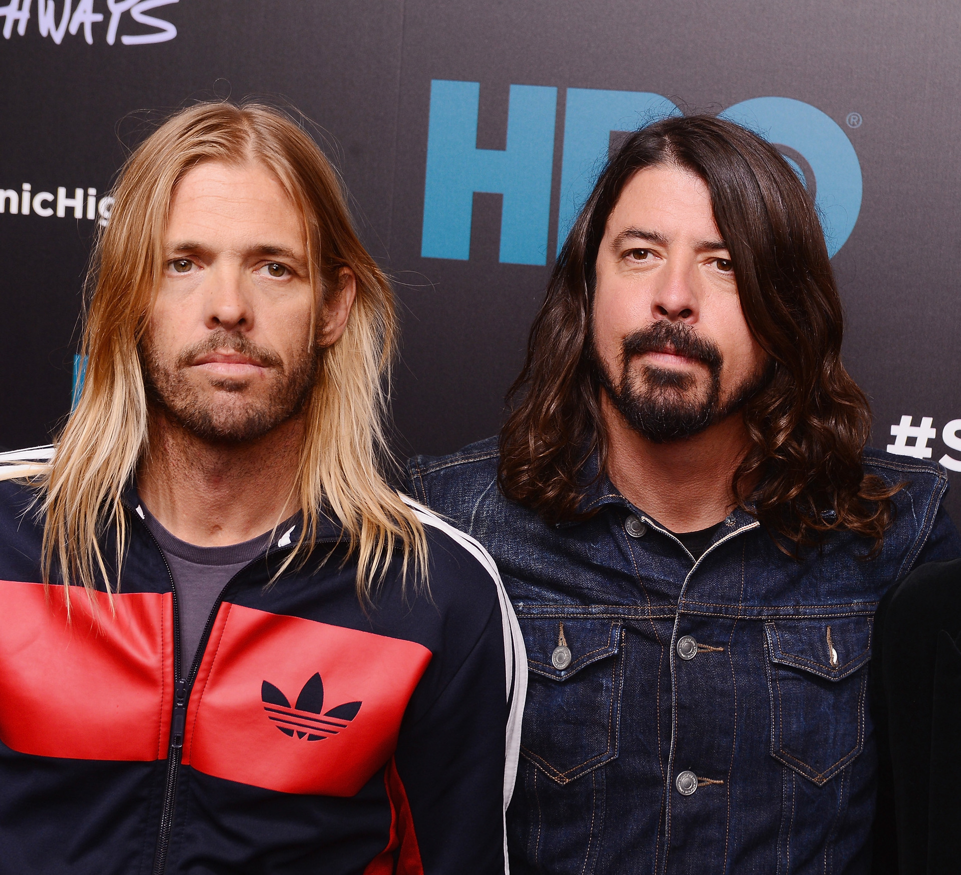 Taylor Hawkins and Dave Grohl of The Foo Fighters attend The