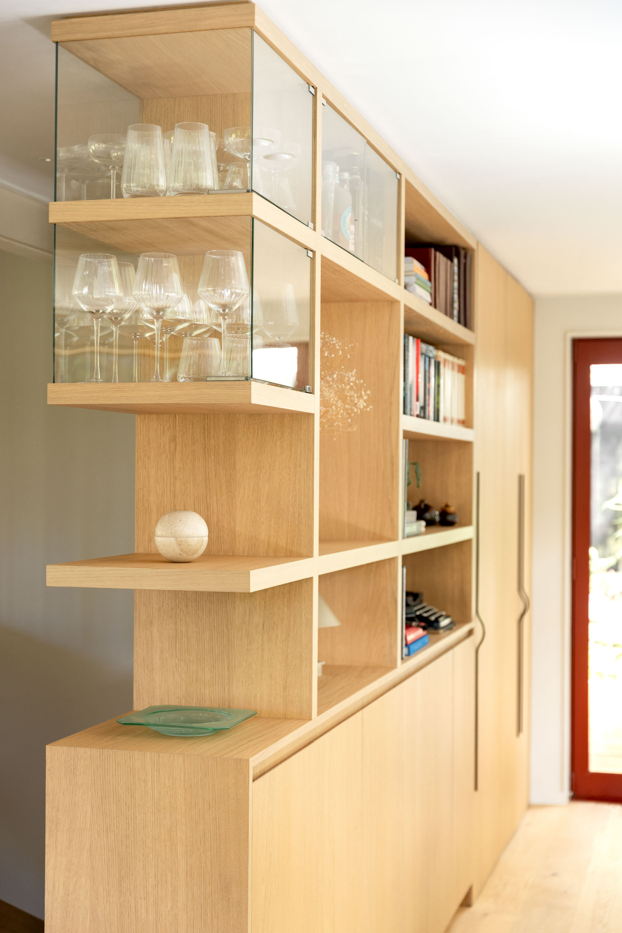 Built-in cabinetry and storage is a key feature of the Titirangi home renovation. Photo / Babiche Martens