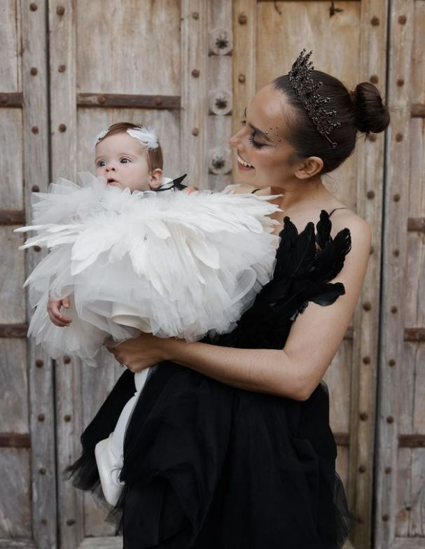 Morgan Lupton as Black Swan and her niece Noa as White Swan for her sister Jaimee's Halloween party.
