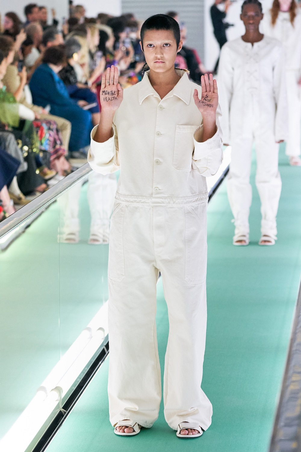 Ayesha Tan Jones protesting on the runway at Gucci's recent spring/summer 2020 show. Photo / Supplied