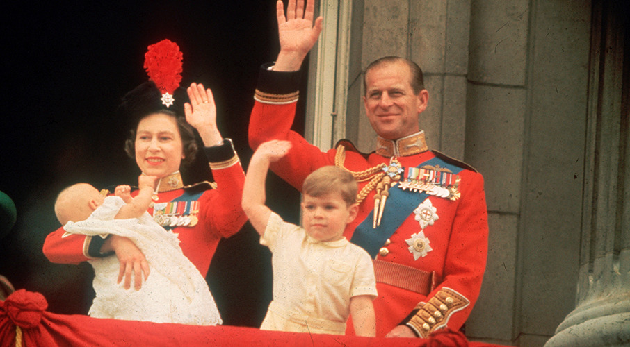 Queen Elizabeth, Prince Philip, Prince Andrew and Prince Edward waving to the crowds from the balcony at Buckingham Palace, during the Trooping of the Colour in 1964. Photo / Getty Images