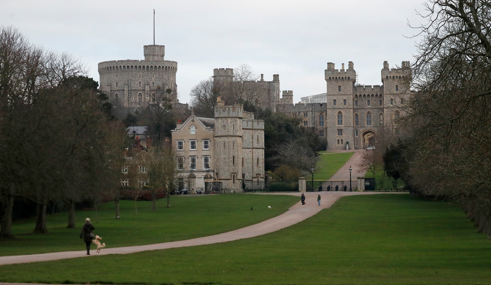 Pedestrians walk the Long Walk in front of Windsor Castle, near the Frogmore Cottage home of Harry and Meghan in Windsor. Photo / AP