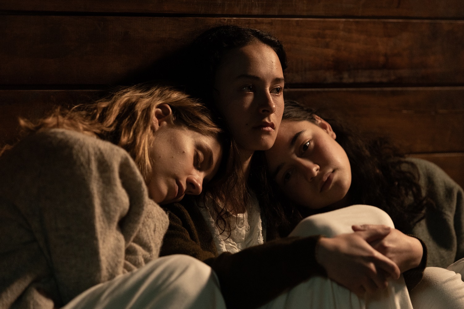 Lou (Nathalie Morris), Nellie (Erana James) and Daisy (Manaia Hall) share a cold, leaky hut at the reform school, but find comfort in each other. 