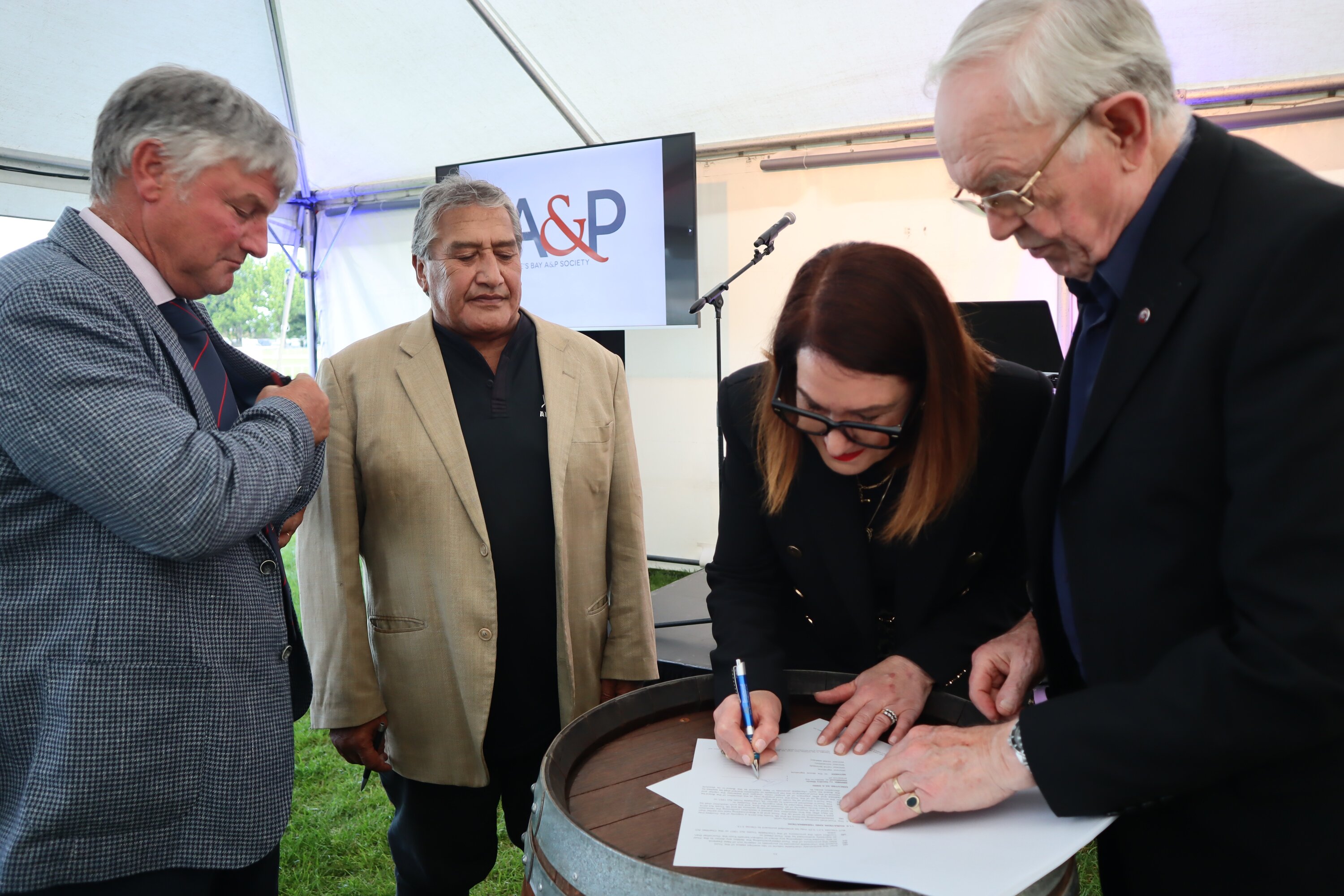 Formal signing of the deed for the charitable trust to oversee the Tōmoana Showgrounds ongoing management Simon Collin(left), Ngahiwi Tomoana, mayor Sandra Hazlehurst, Mark von Dadelszen.