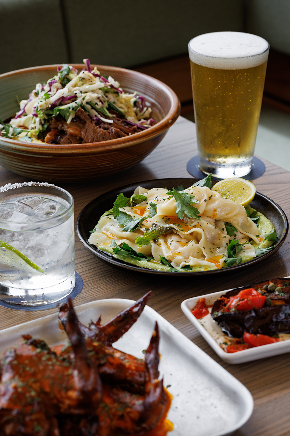 The lobster ravioli, brisket on mash and buffalo chicken wings on the menu at Full Time in Kingsland. Photo / Babiche Martens