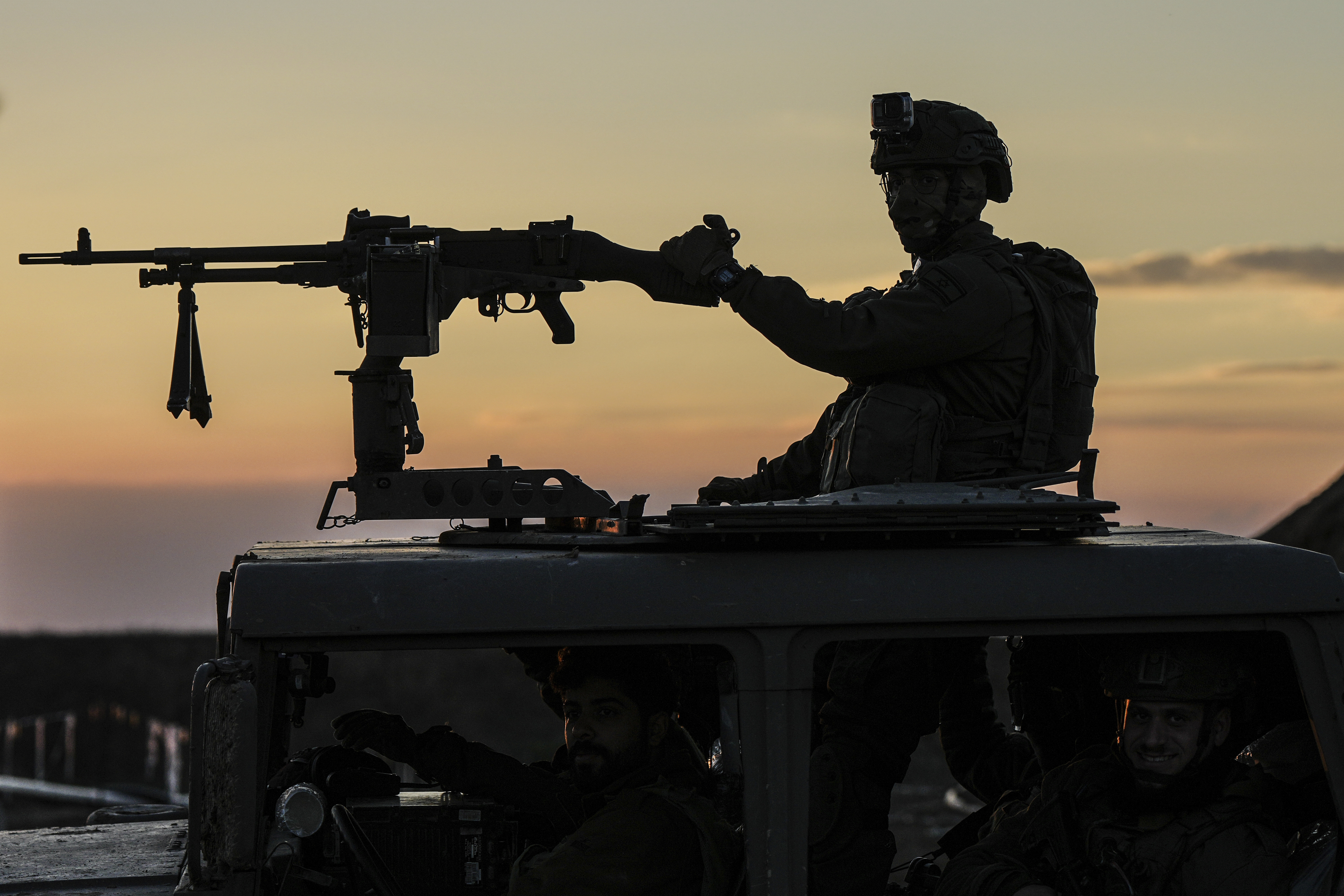 An Israeli soldier takes up position on the border with the Gaza Strip in southern Israel. Photo / AP