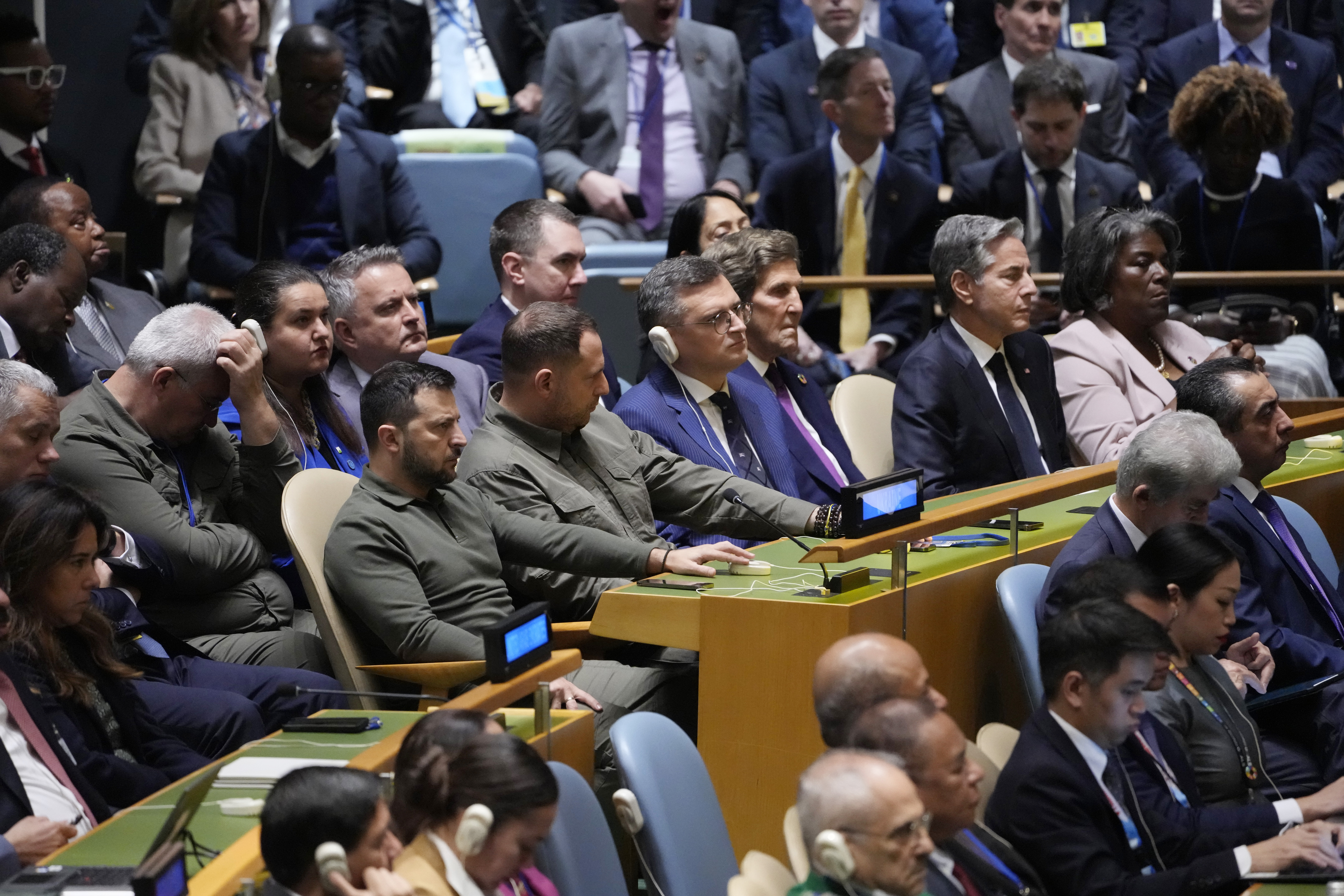 Ukrainian President Volodymyr Zelensky listens as President Joe Biden addresses the 78th United Nations General Assembly in New York. Photo / AP