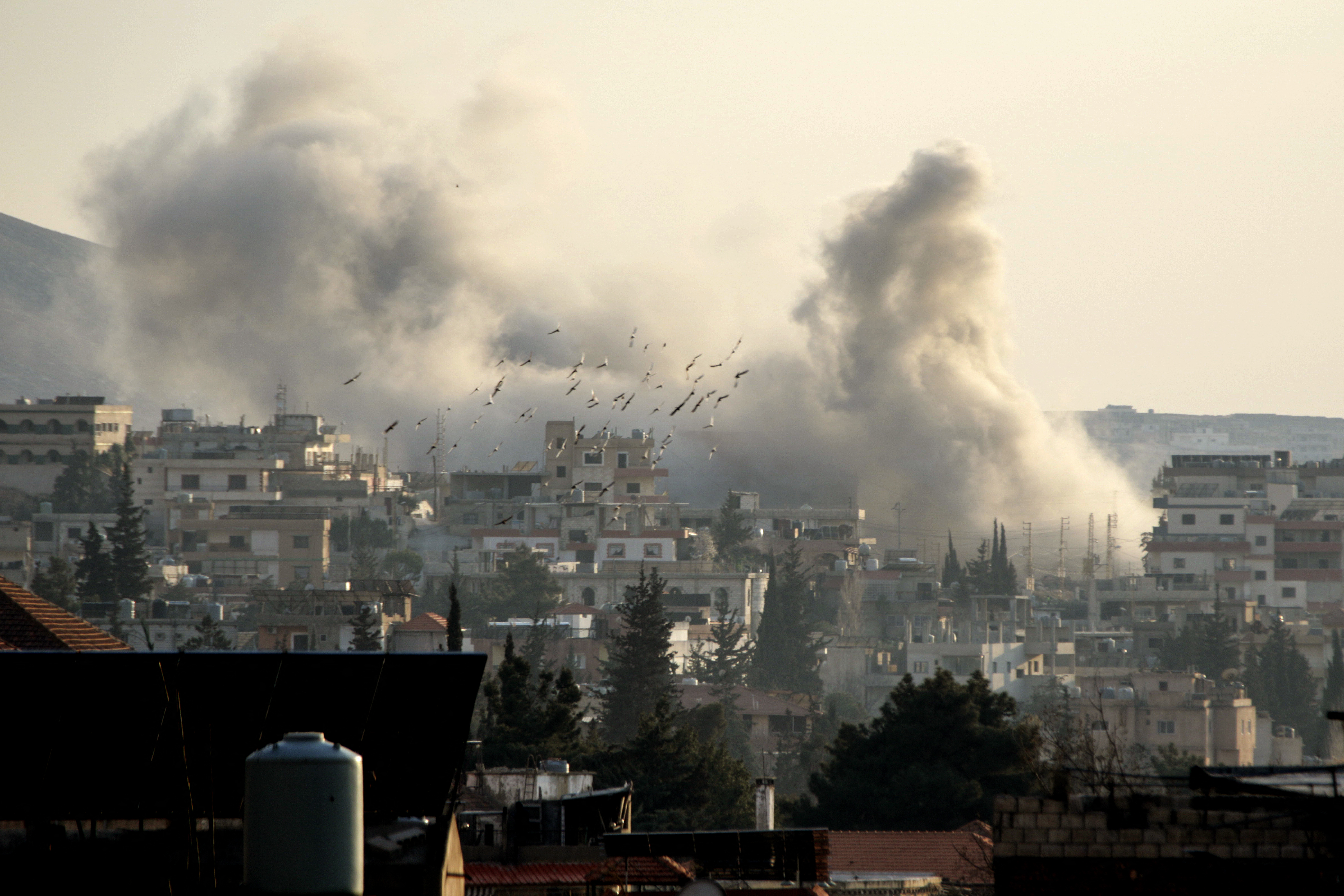 Smoke rises from the site of an Israeli airstrike that targeted the offices of Al-Qard al-Hassan, a Hezbollah-linked financial institution, in the city of Baalbeck in Lebanon's Bekaa valley. Photo / Nidal Solh, AFP