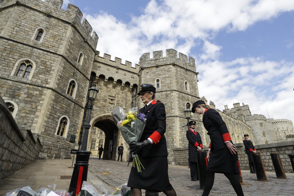Wardens lay flowers outside Windsor Castle. Photo / AP