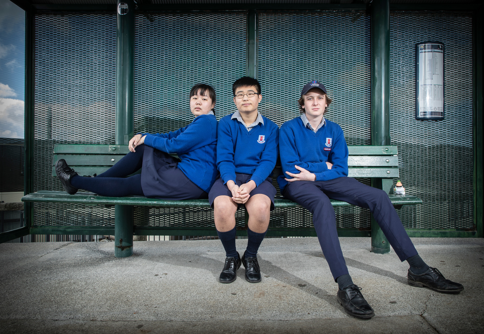 MacLeans College students(from left) Angela Zhang, Justin Hu and Cole Stranaghan have complained about overcrowding on fewer school buses. 