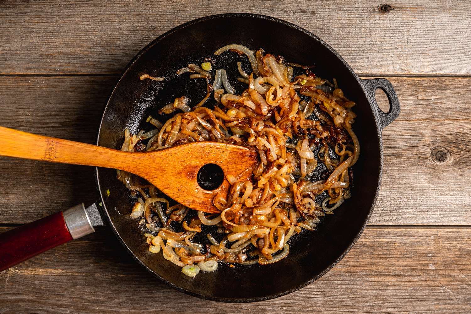 Patience is key to unlocking that rich, sweet flavour which makes caramelised onions so special. Photo / Getty Images