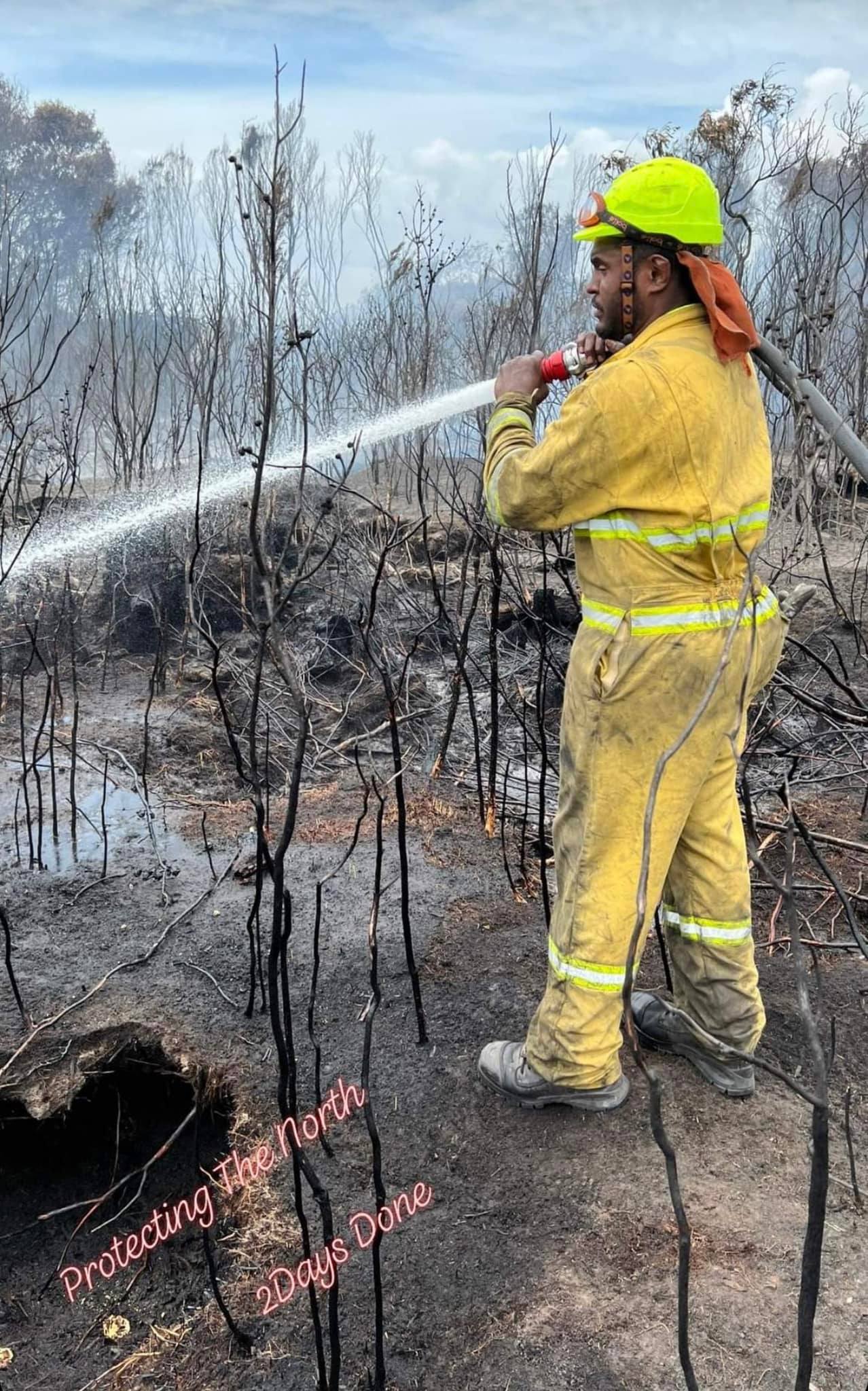 Firefighter Jone Macilai on the fire front at a wildfire at Kaimaumau, in the Far North, in January 2022