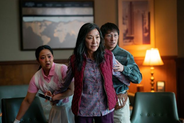 This image released by A24 Films shows, from left, Stephanie Hsu, Michelle Yeoh and Ke Huy Quan in a scene from 