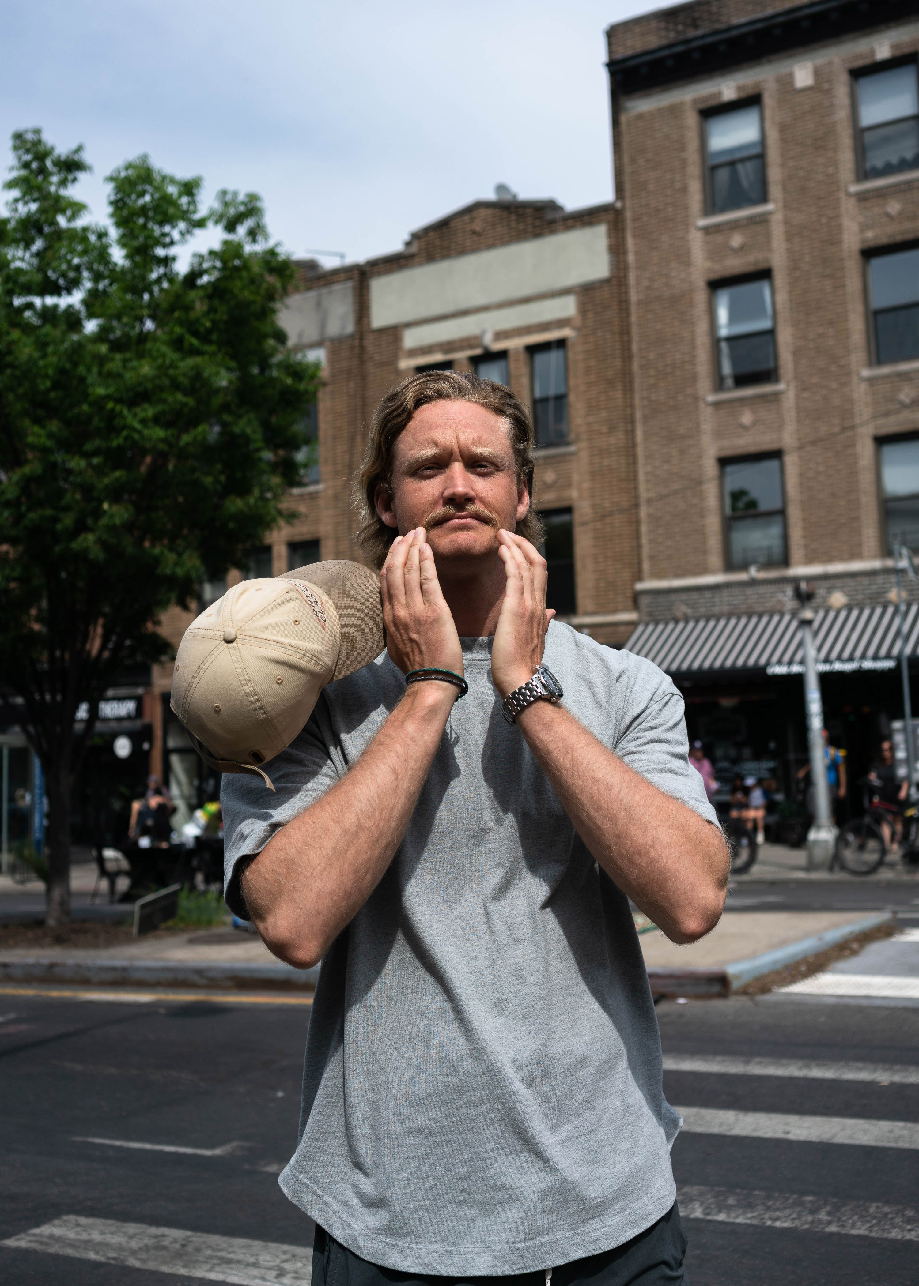 Alex Booher, a business student who sports a moustache, in New York. Photo / Ali Cherkis, The New York Times