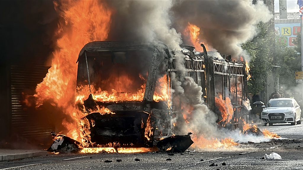A bus was set on fire by protesters in east Belfast as disorder flared during an anti-immigration demonstration organised in response to a stabbing attack in the city. Photo / Getty Images