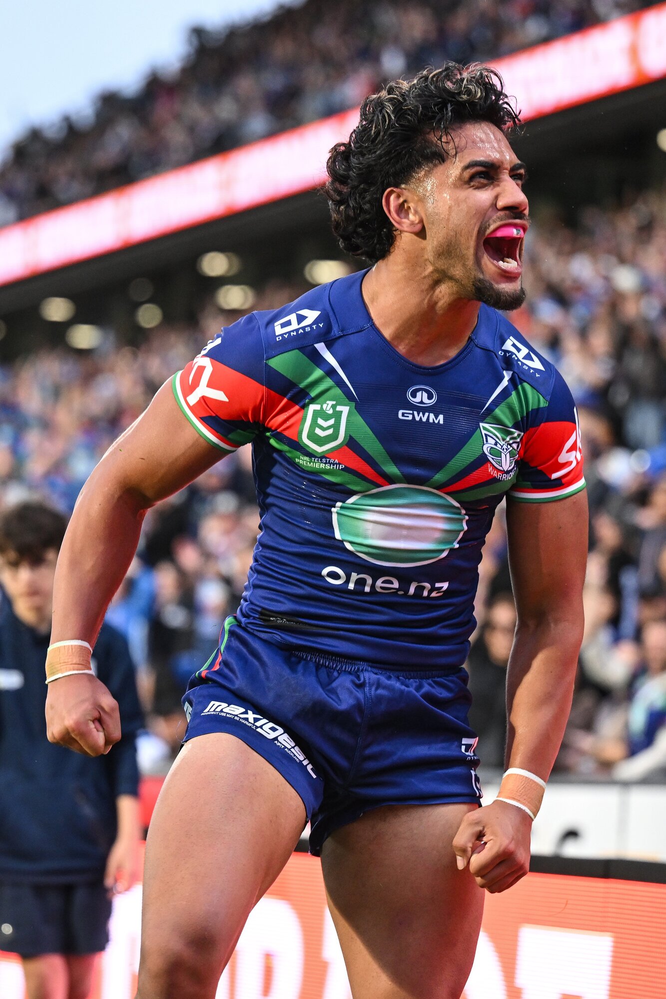 Warriors star Alofi'ana Khan-Pereira celebrates another try. Photo / Photosport 