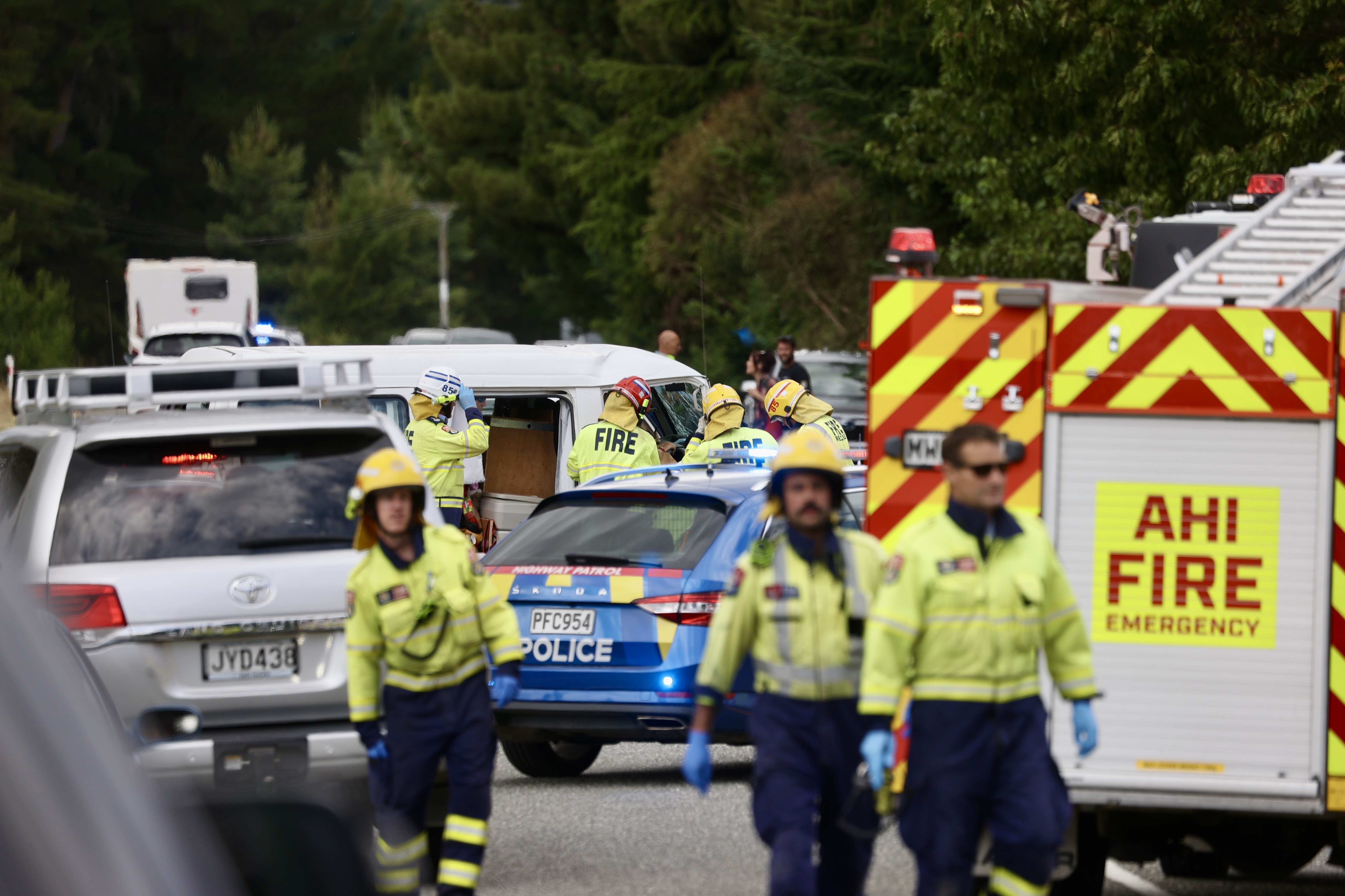 Emergency services respond to a crash on State Highway 6 near Wānaka. Photo / George Heard