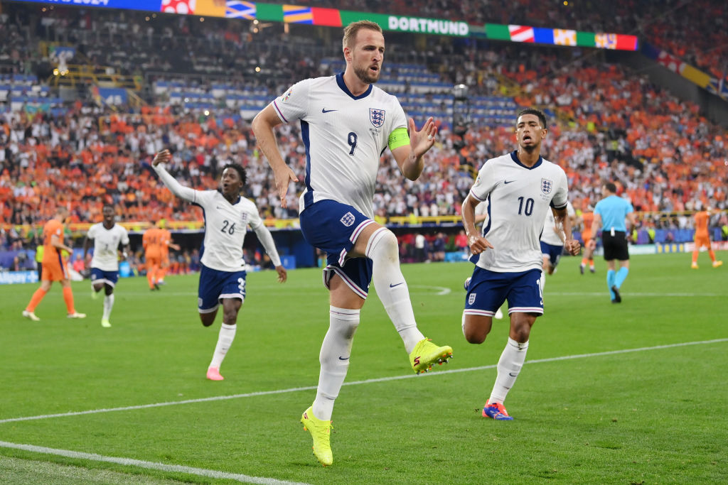 Harry Kane of England celebrates scoring his team's first goal from a penalty kick with teammates Kobbie Mainoo and Jude Bellingham during the Euro 2024 semi-final against Netherlands. Photo / Getty Images