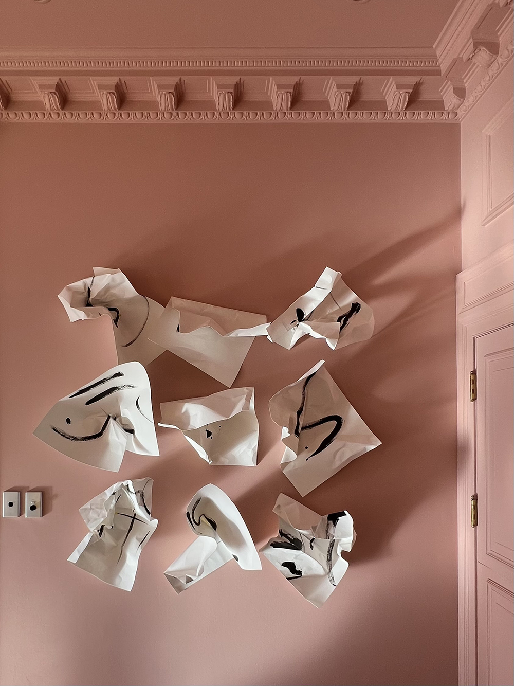 On one wall, there’s ink on paper, crumpled up and pinned down. Photo / Hōne Naera Scott