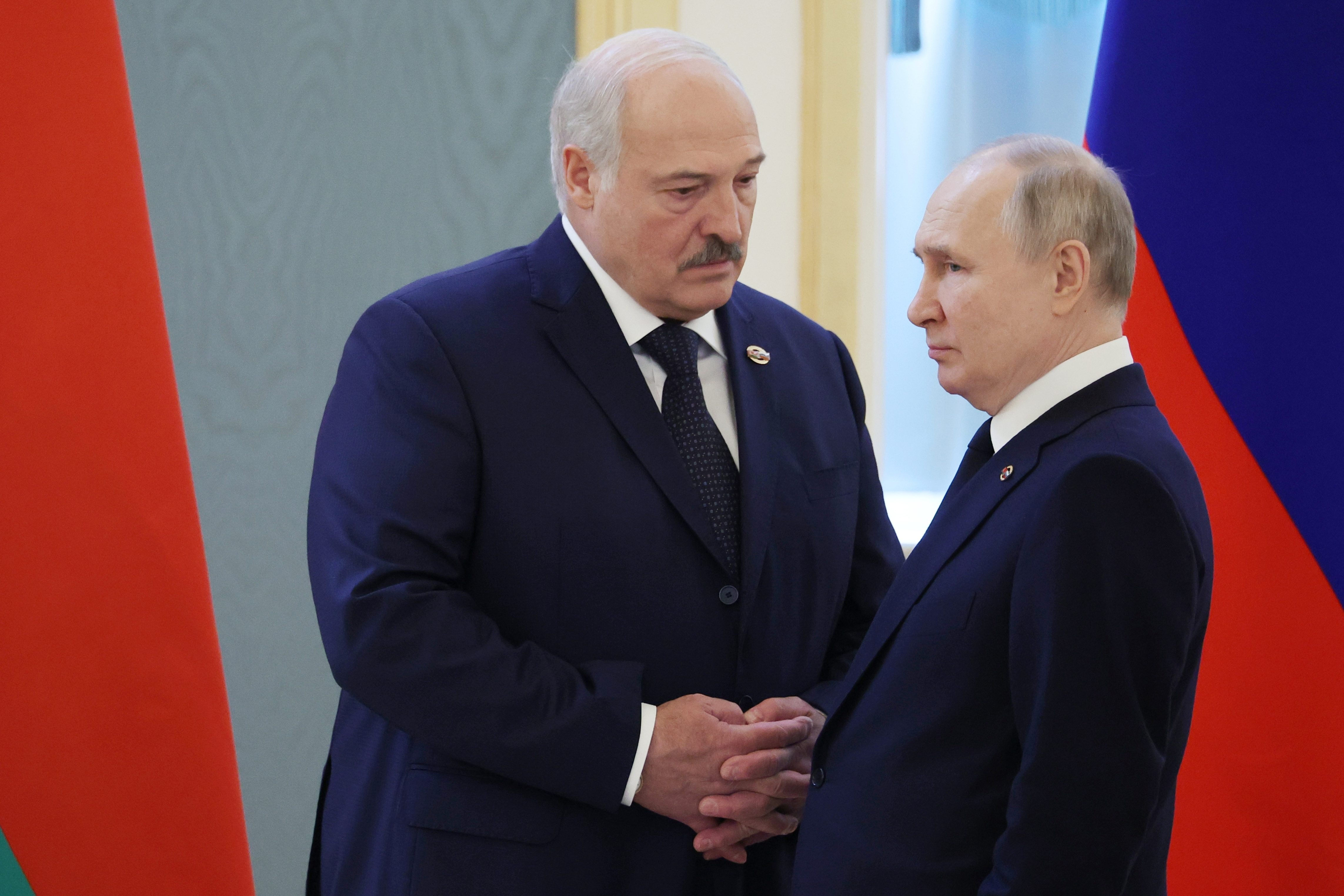 Belarusian President Alexander Lukashenko, left, with Russian President Vladimir Putin. Lukashenko argues that hosting Russian nuclear weapons in his country is meant to deter aggression by Poland. Photo / AP