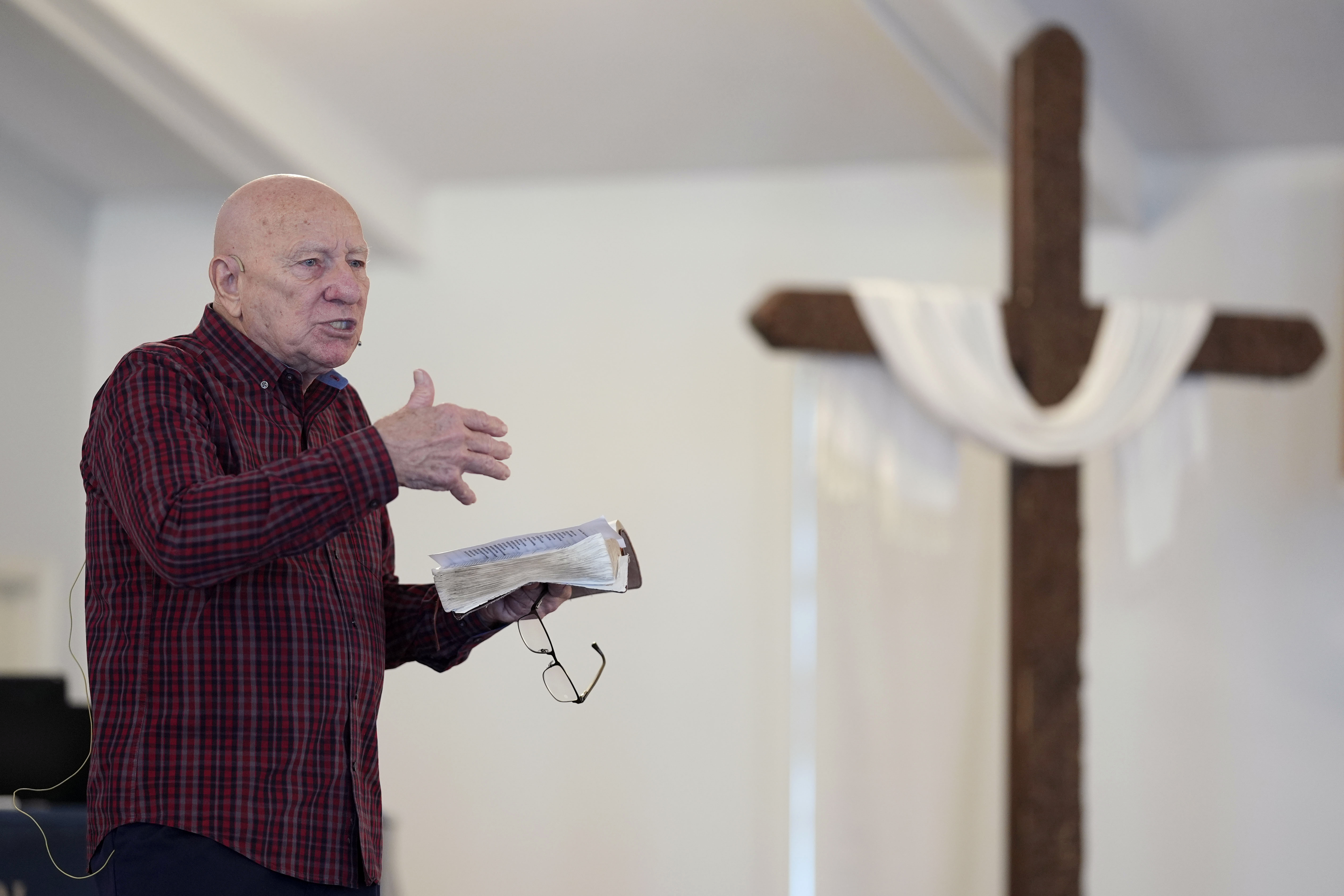 First Church of God Pastor Charles Hundley leads the morning service in Des Moines, Iowa. Former President Donald Trump and his rivals for the GOP nomination have pushed for endorsements from pastors and faith communities. Photo / AP