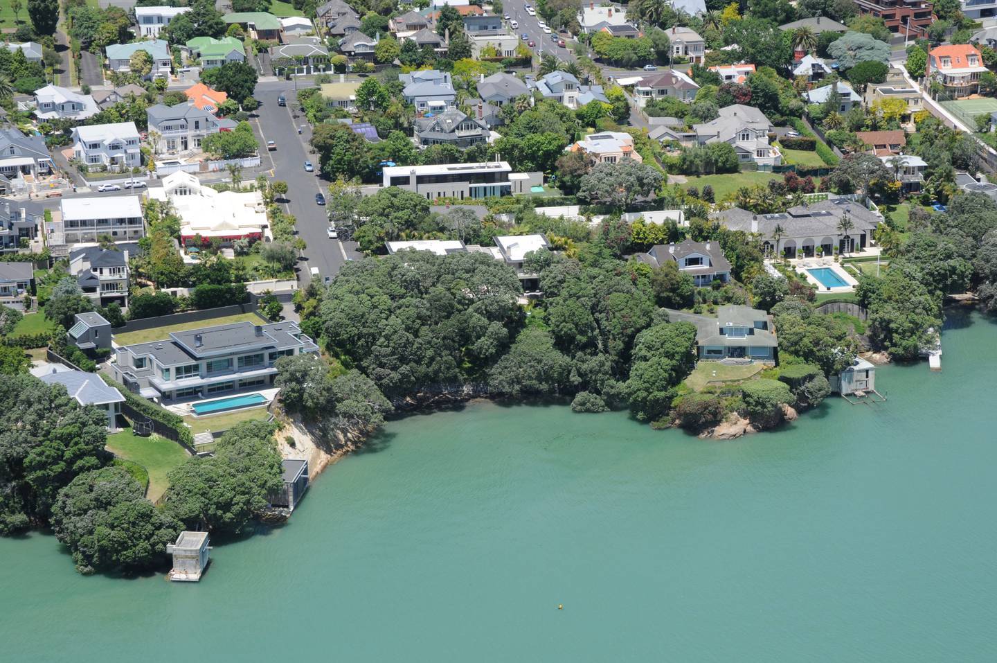The Herbert home in Herne bay (left) designed by Brent Hulena. Photo / Jason Oxenham