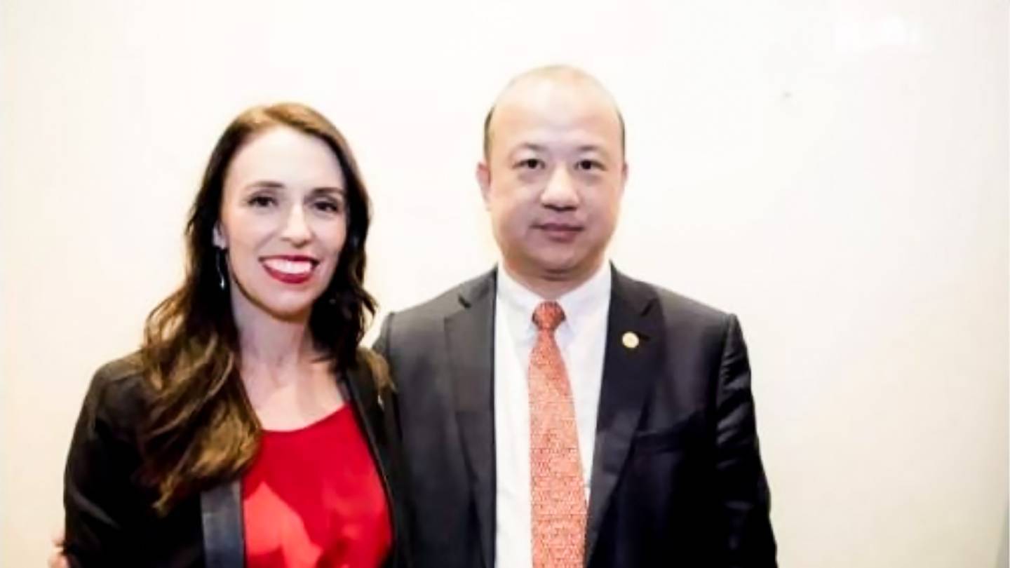 Prime Minister Jacinda Ardern with Yikun Zhang, who obtained a royal honour for his services to further New Zealand-Chinese relations in 2018. Photo / Supplied
