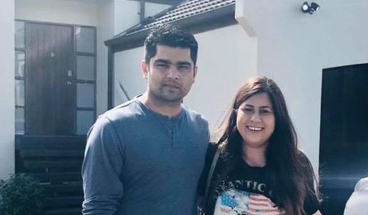 Ameet Bhargav and his wife Renu outside their leaky house in Goodwood Heights, Manukau shortly after buying the property in 2020. Photos / Supplied