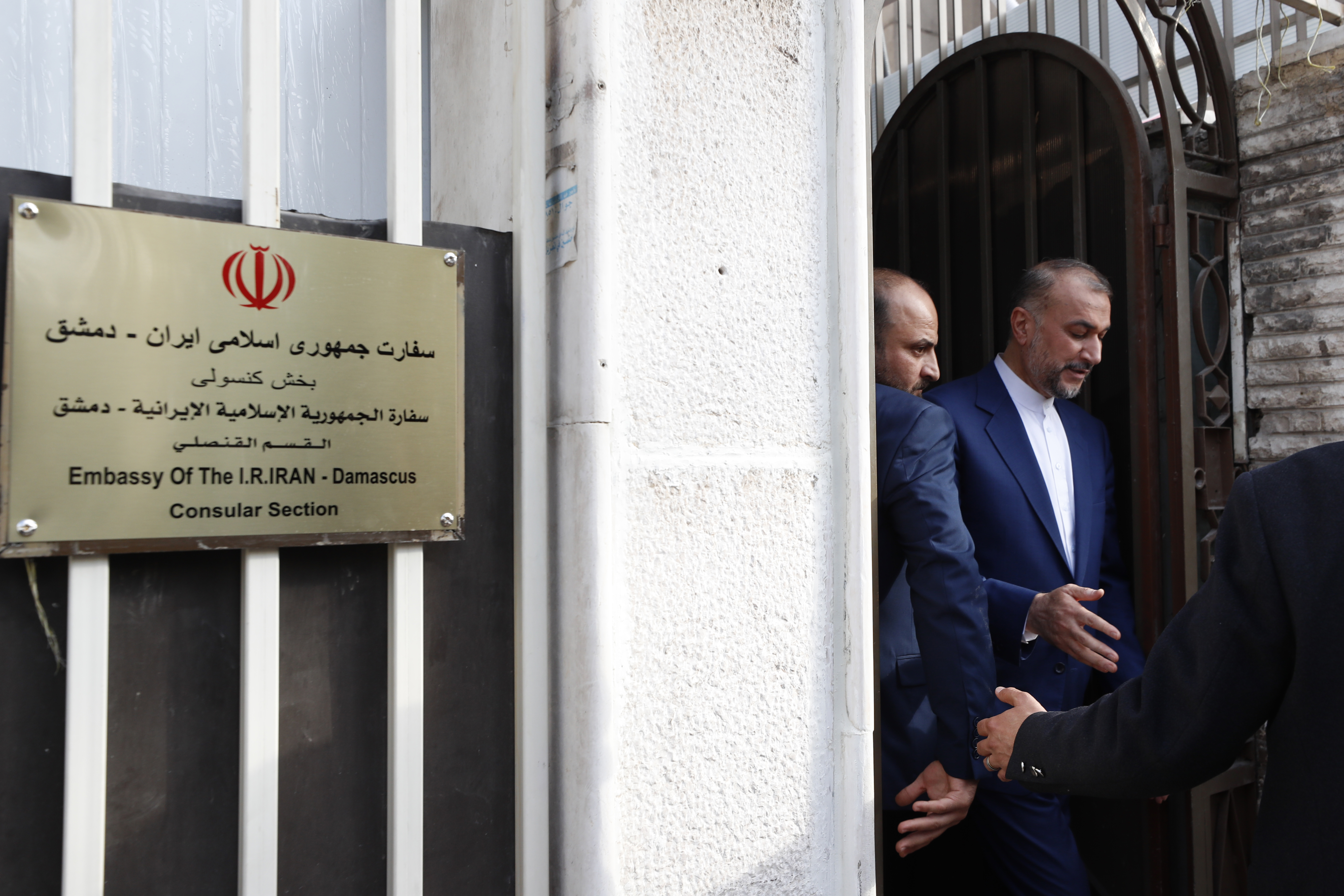 Iranian Foreign Minister Hossein Amirabdollahian, right, leaves after the opening of the new Iranian consulate building in Damascus. Photo / AP
