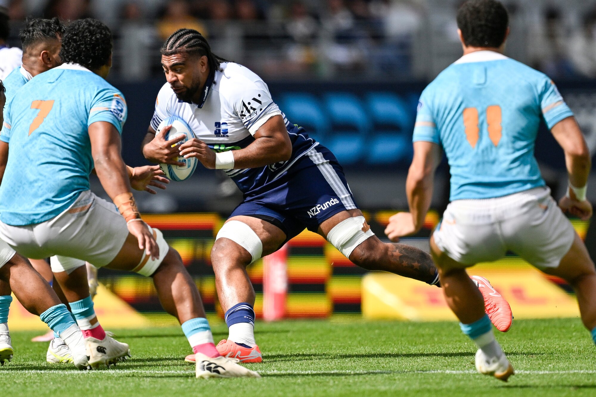 Hoskins Sotutu carries the ball into the Moana Pasifika defensive line for the Blues. Photo / Photosport