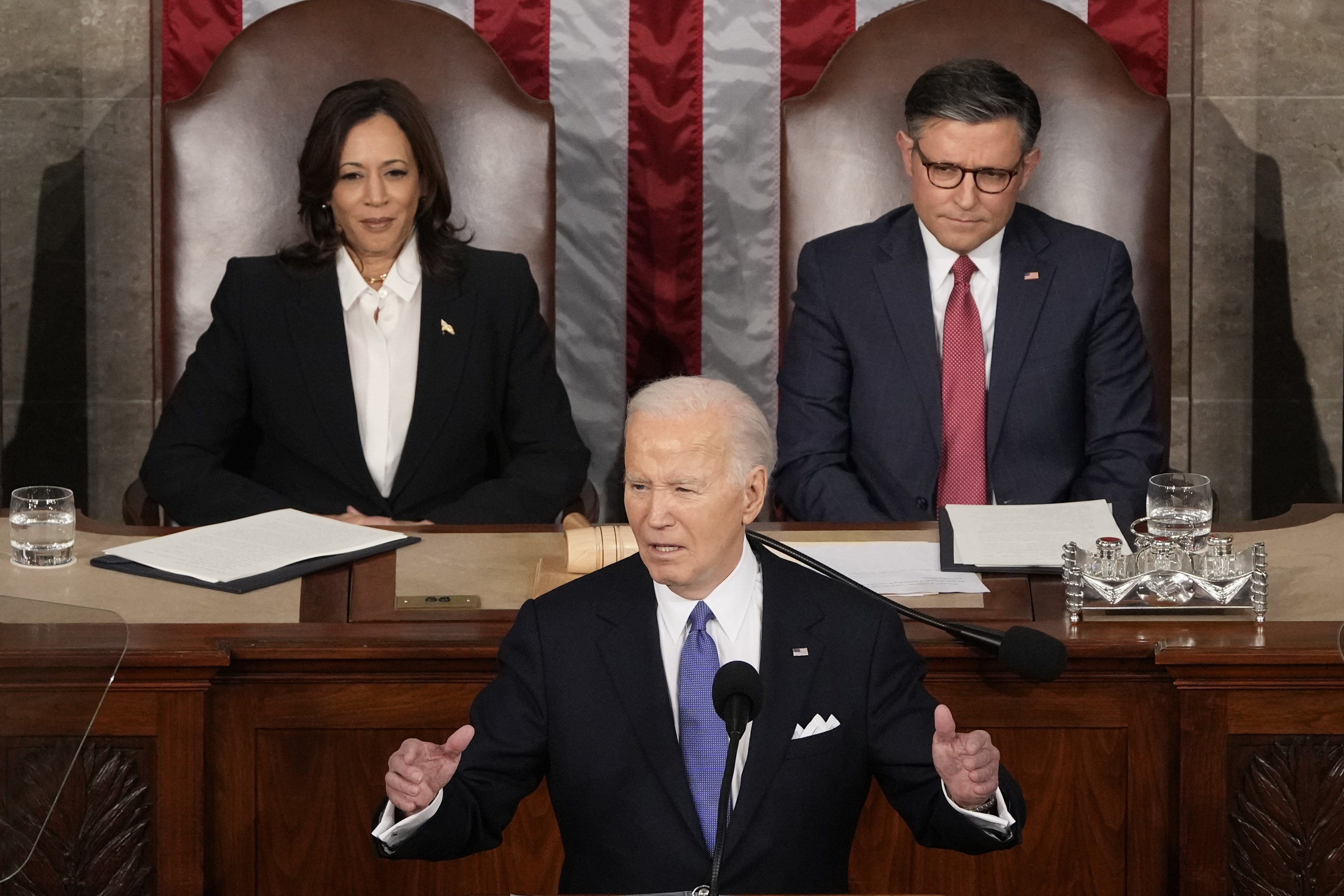 President Joe Biden speaks during the State of the Union address as Vice President Kamala Harris and House Speaker Mike Johnson listen. Photo / AP