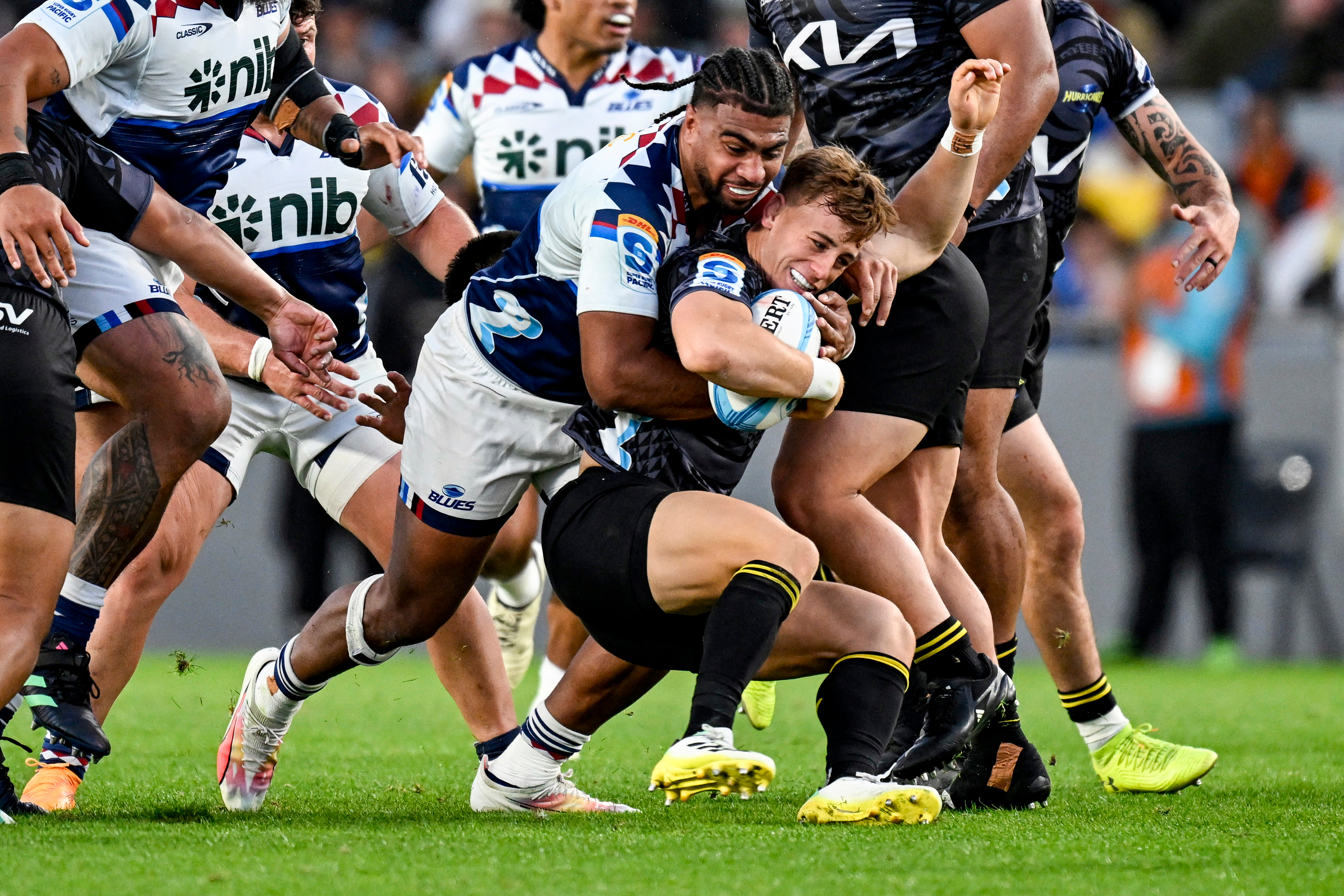 Hoskins Sotutu tackles Ruben Love during the Blues' win over the Hurricanes. Photo / Photosport