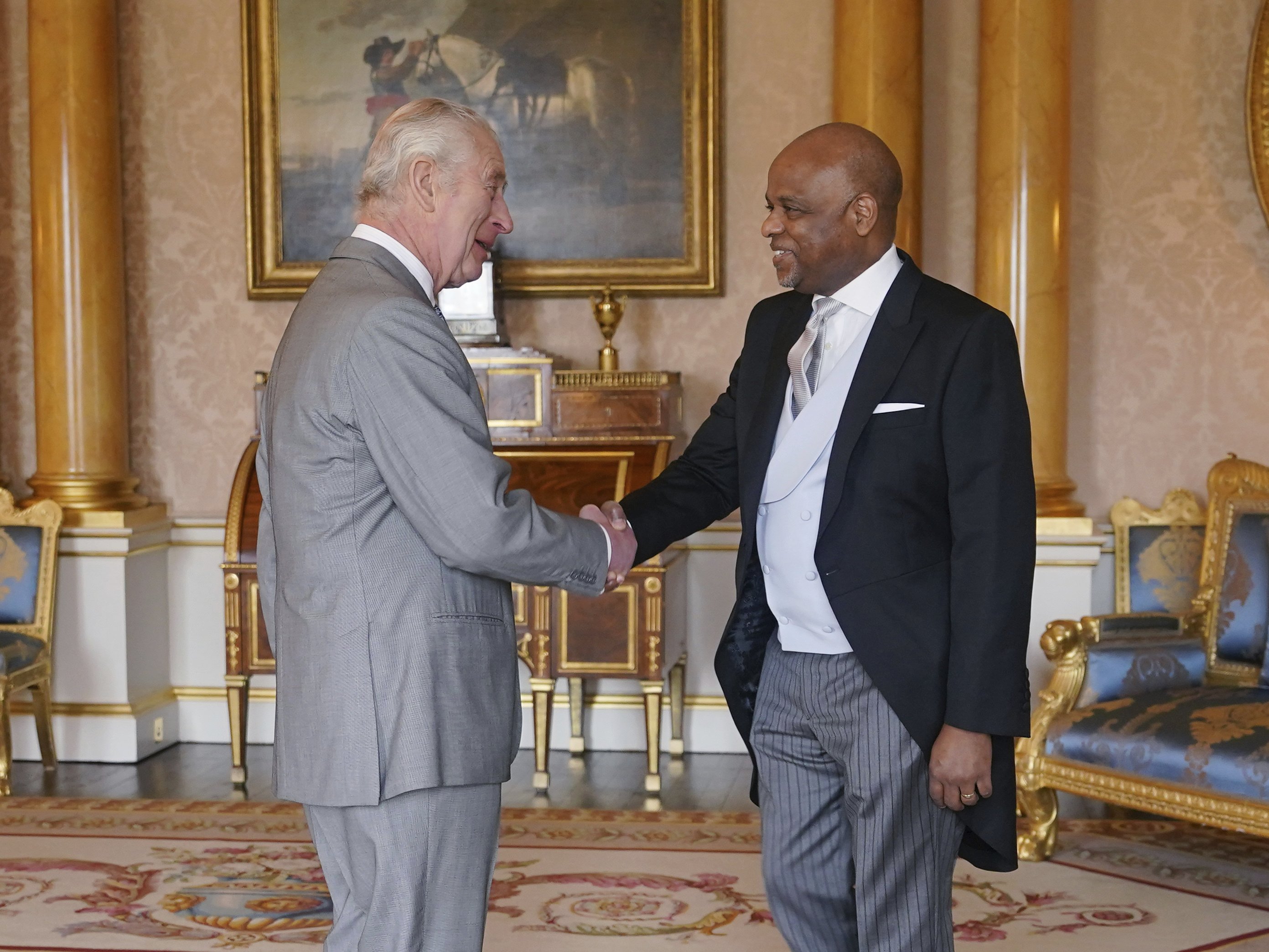 The King is continuing his state duties from home but was photographed meeting Alexander Williams, the High Commissioner of Jamaica, at Buckingham Palace on Thursday March 7. Photo / Pool via AP
