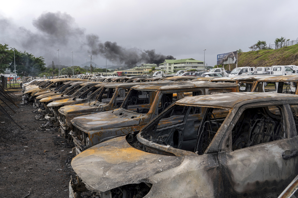 Burnt cars in Noumea, New Caledonia, following the civil unrest. Photo / Nicolas Job, AP