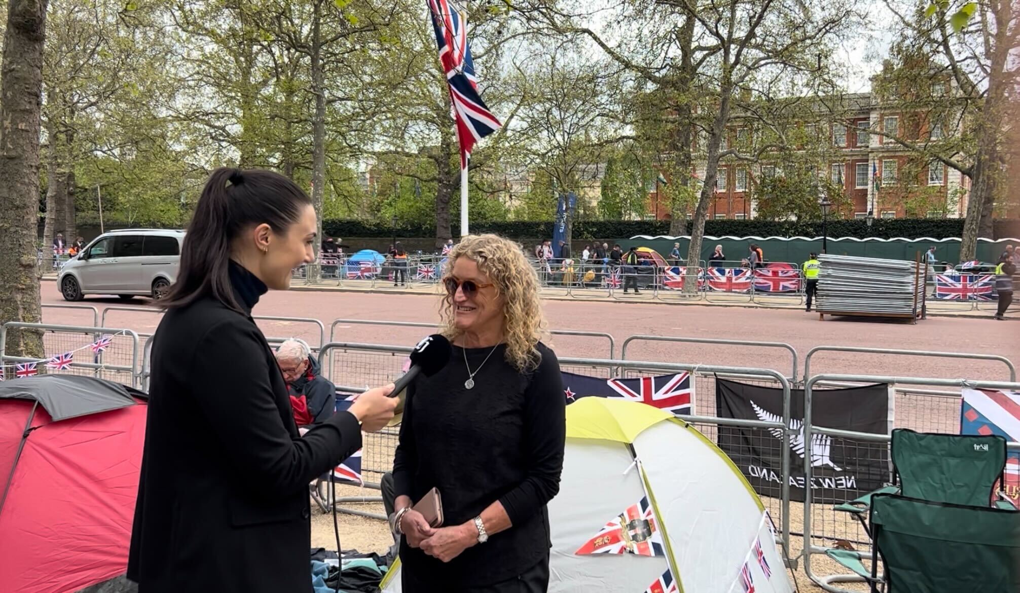 Mo is ready with her $19 Kmart tent and bottle of bubbles. Photo / NZ Herald