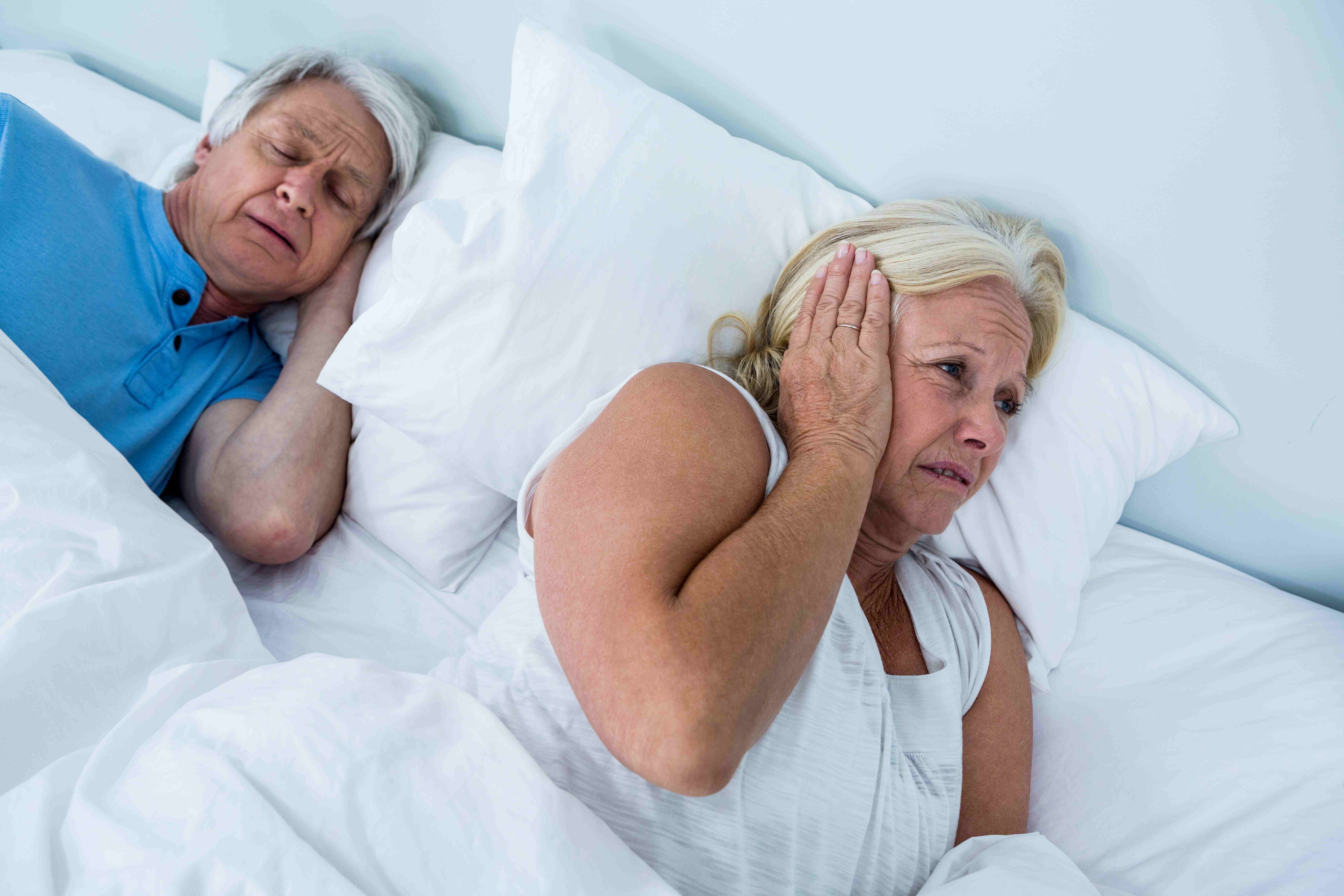 Snoring partners can significantly disrupt sleep, often leading to separate sleeping arrangements. Photo / 123rf