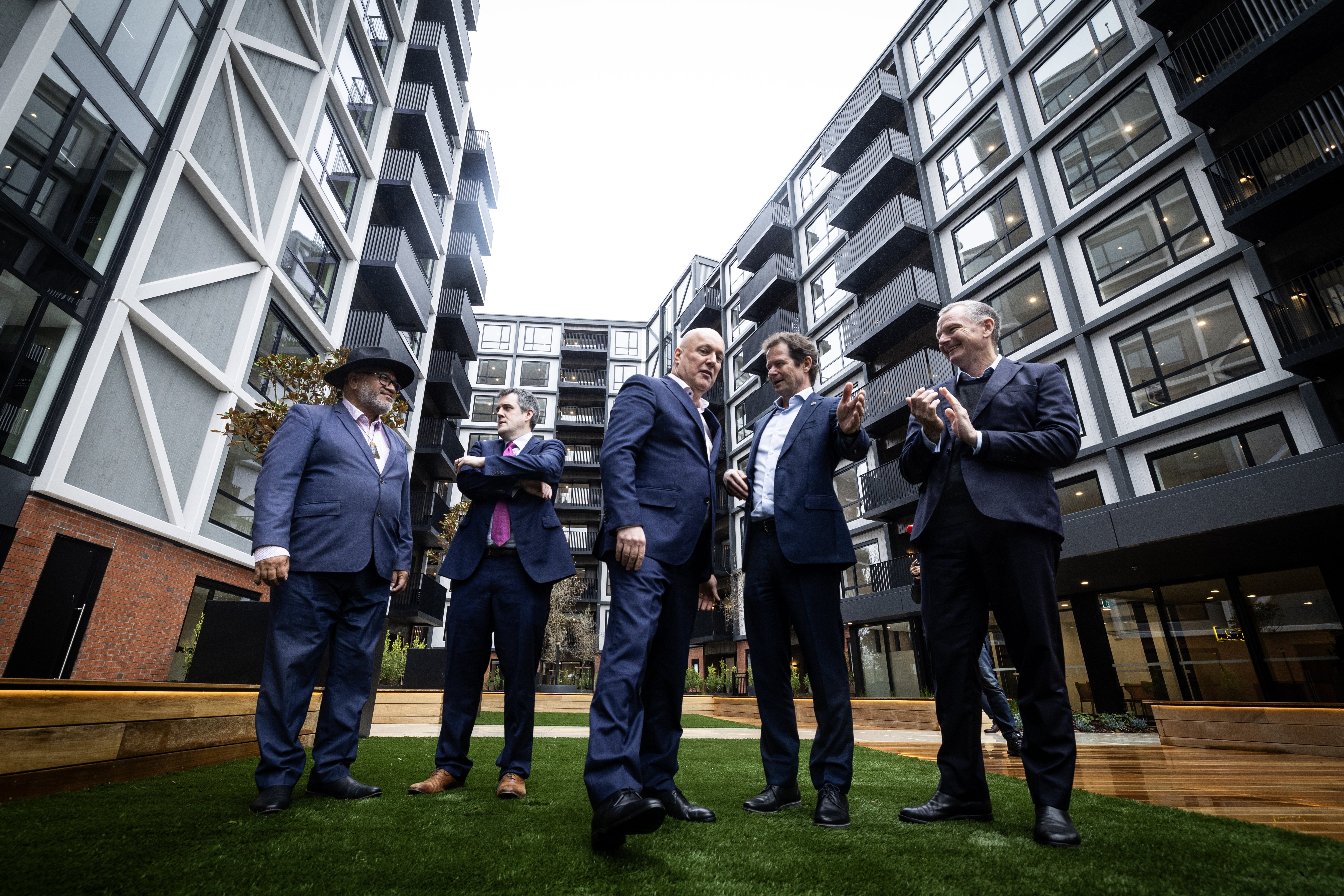 The opening ceremony of the Resido apartment complex in Mt Wellington. (From left) Hauauru Rawiri of Ngati Paoa, Housing Minister Chris Bishop, PM Christopher Luxon, Clive Mackenzie and Simon Shakesheff both from Kiwi Property. Photo / Jason Oxenham