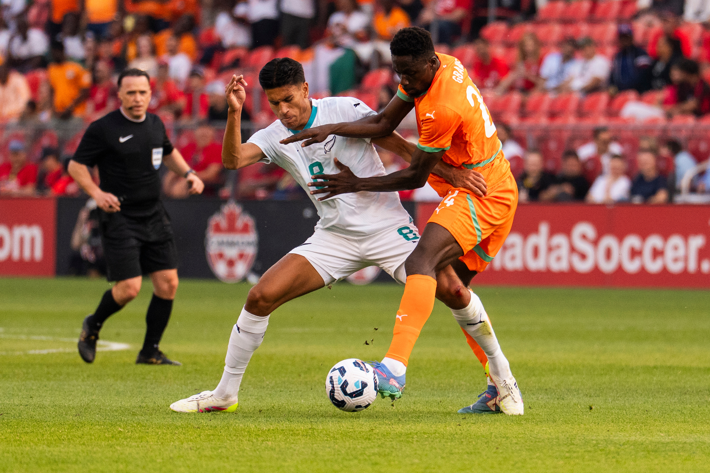 Marko Stamenic battles for the ball against Mory Gbane of the Ivory Coast. Photo / Photosport