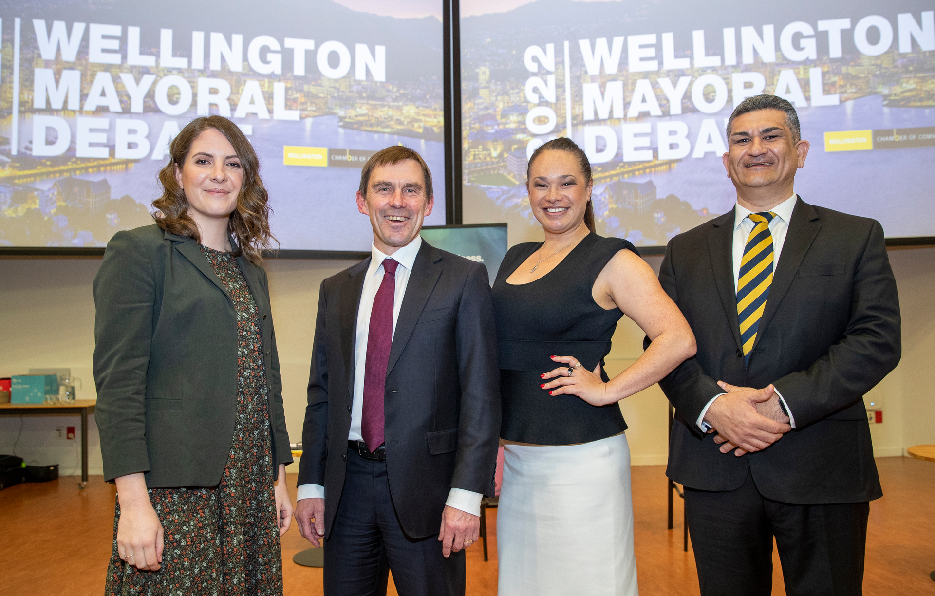 NZ Herald reporter and moderator Georgina Campbell with candidates Andy Foster, Tory Whanau and Paul Eagle before a mayoral debate. Photo / Mark Mitchell
