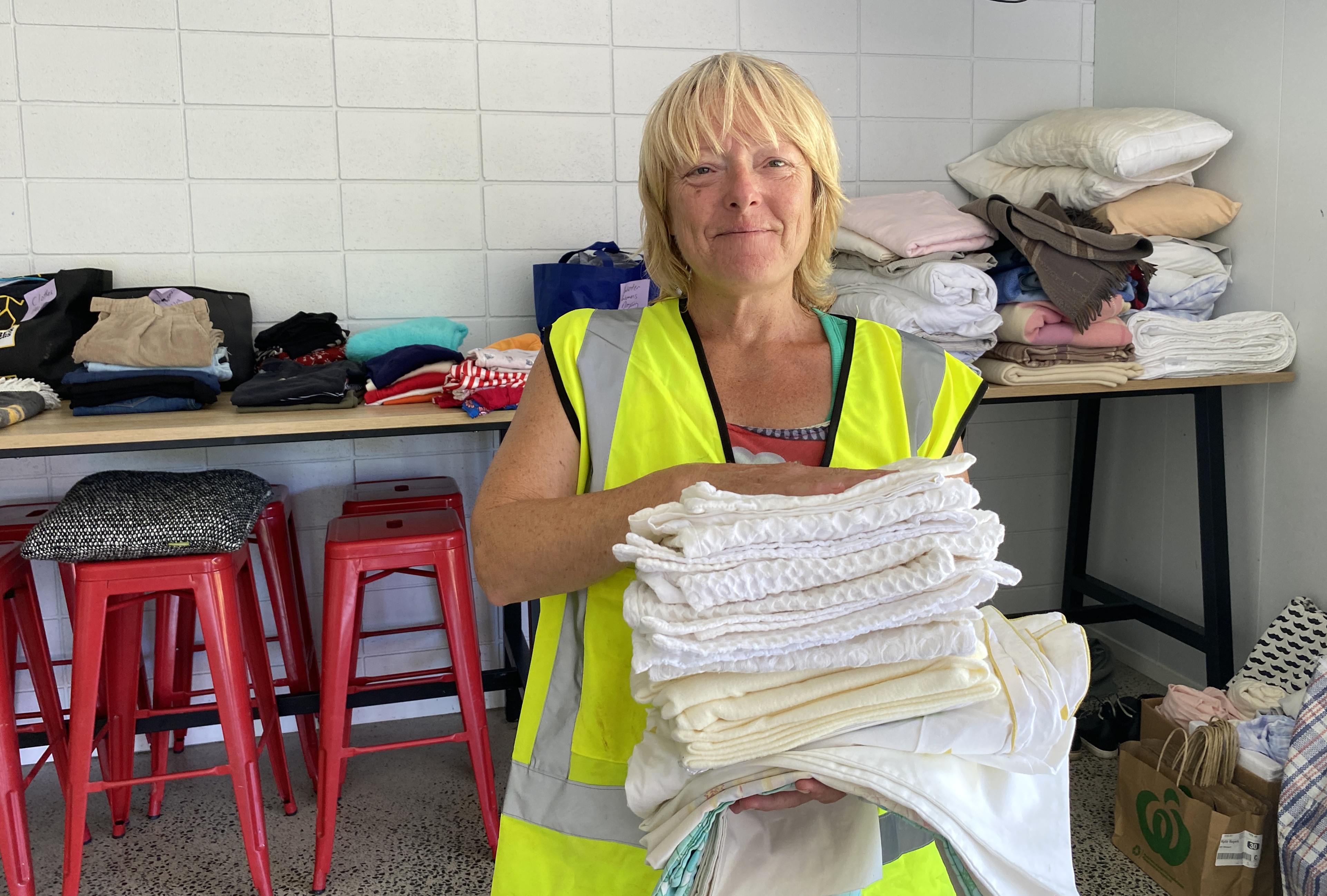 Ōakura Civil Defence volunteer Kylie Rogers says the donated items, including bedding and towels, will come in handy for those who have lost everything. Photo / Denise Piper