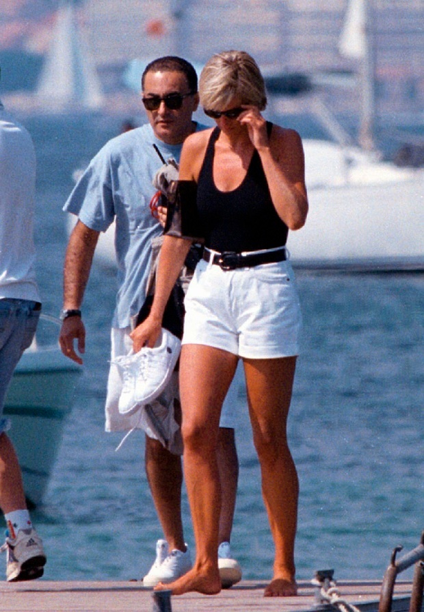 Diana and her companion Dodi Fayed walk on a pontoon in the French Riviera resort of Saint-Tropez, 1997. Photo / AP