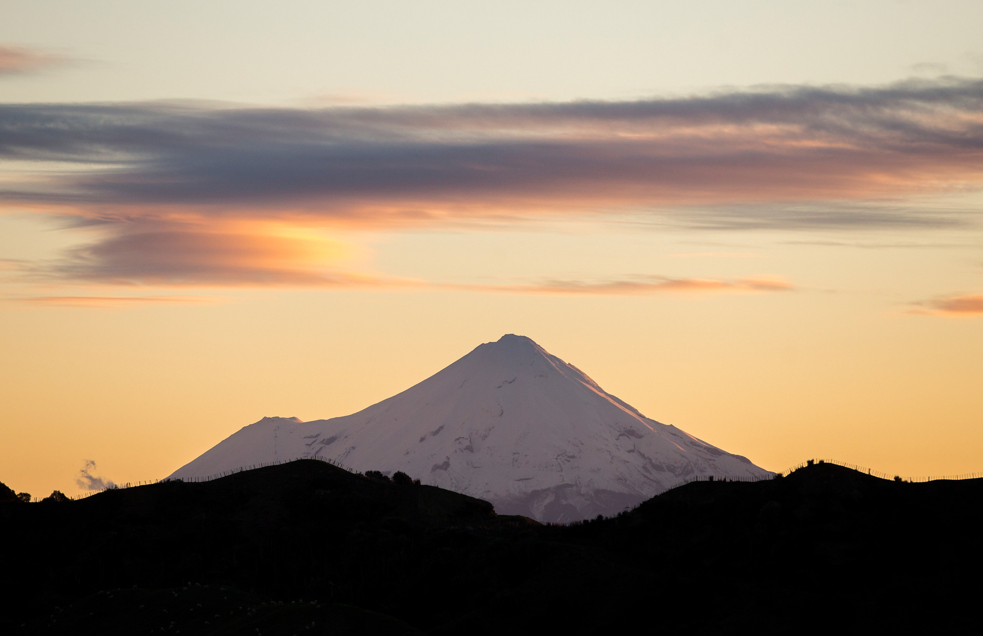 A snow-capped Mount Taranaki summit from above. Photo / Supplied